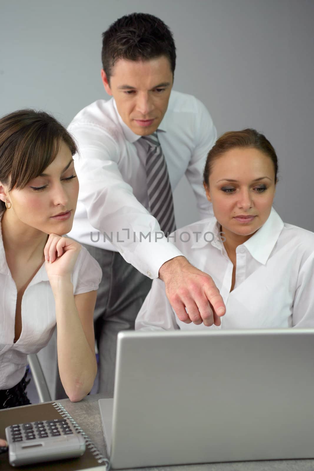 businesspeople working at the office