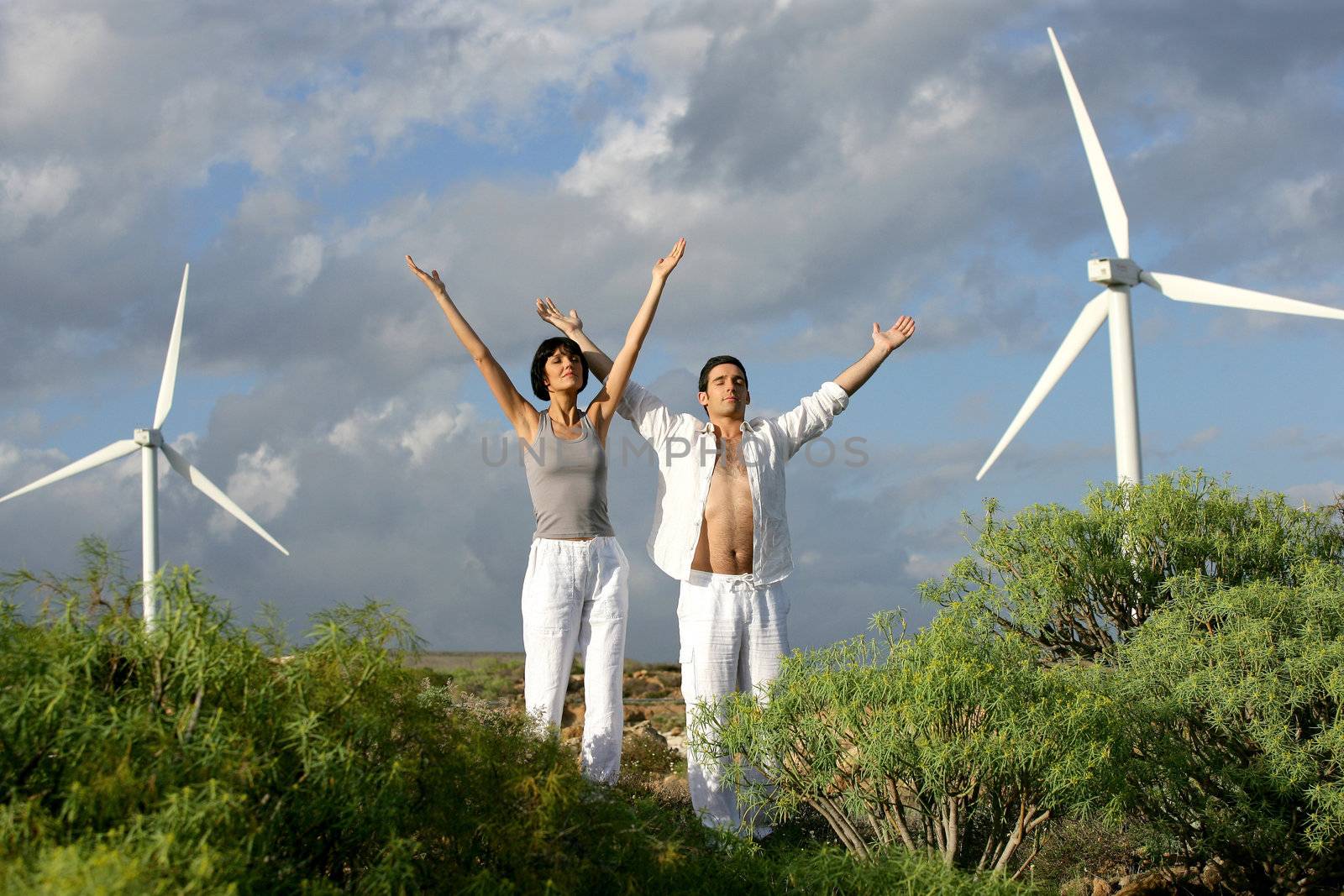 Zen couple on a wind farm