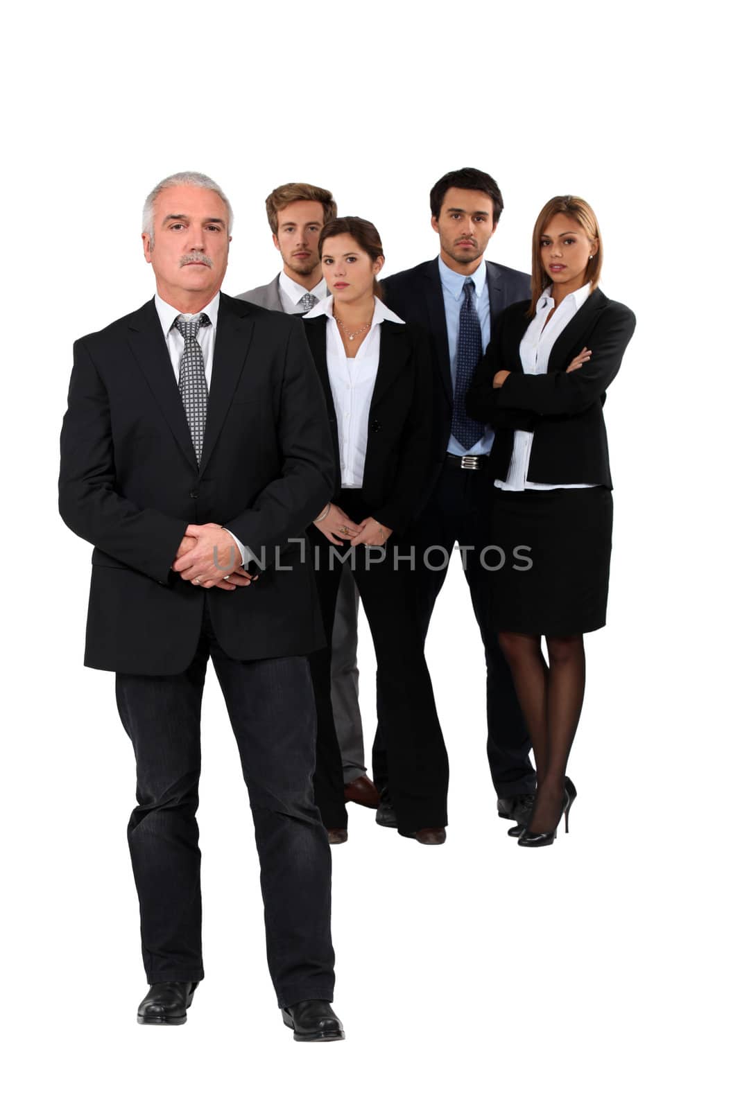 Studio shot of businessman and his team