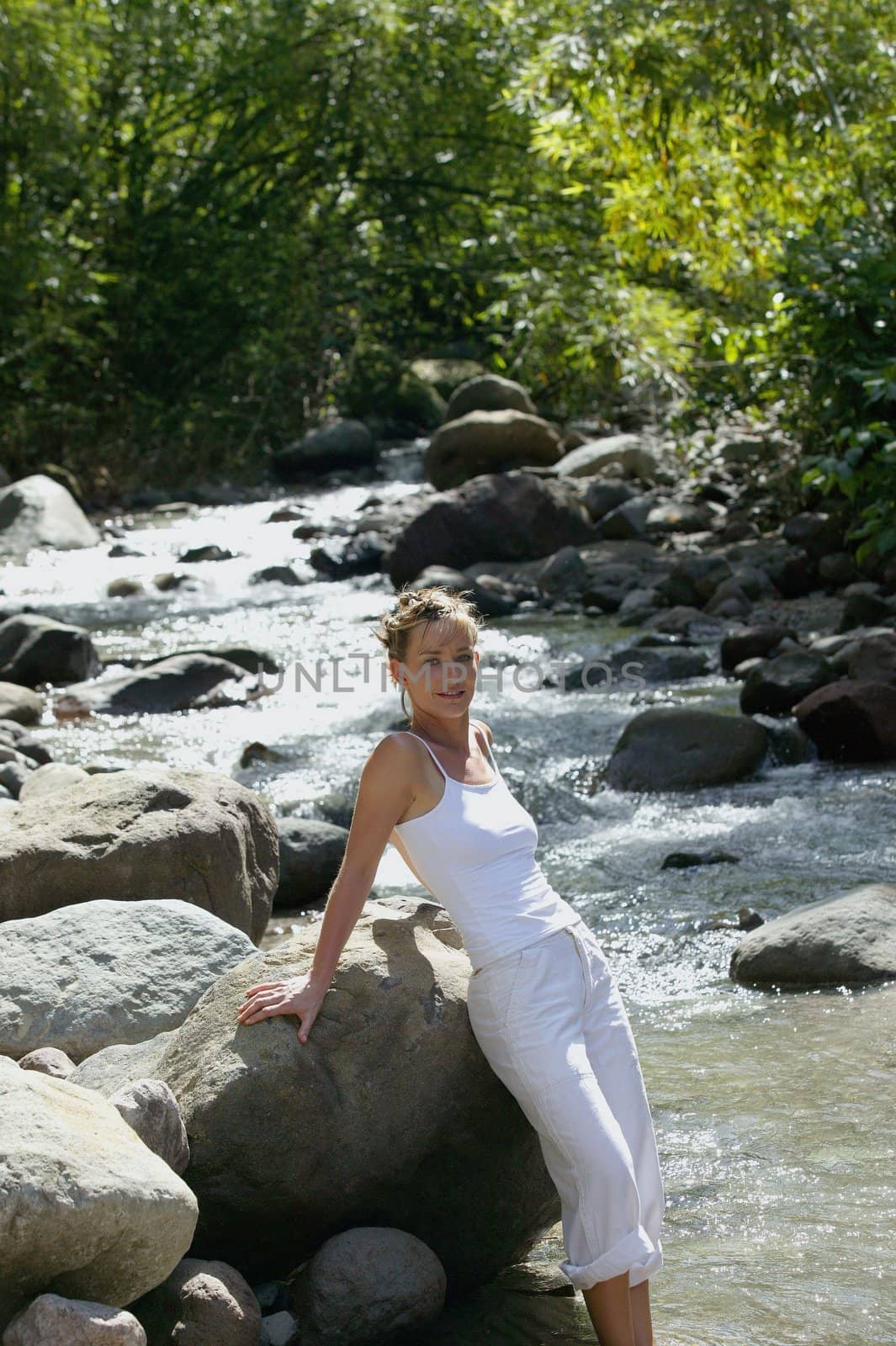 Woman standing in a river