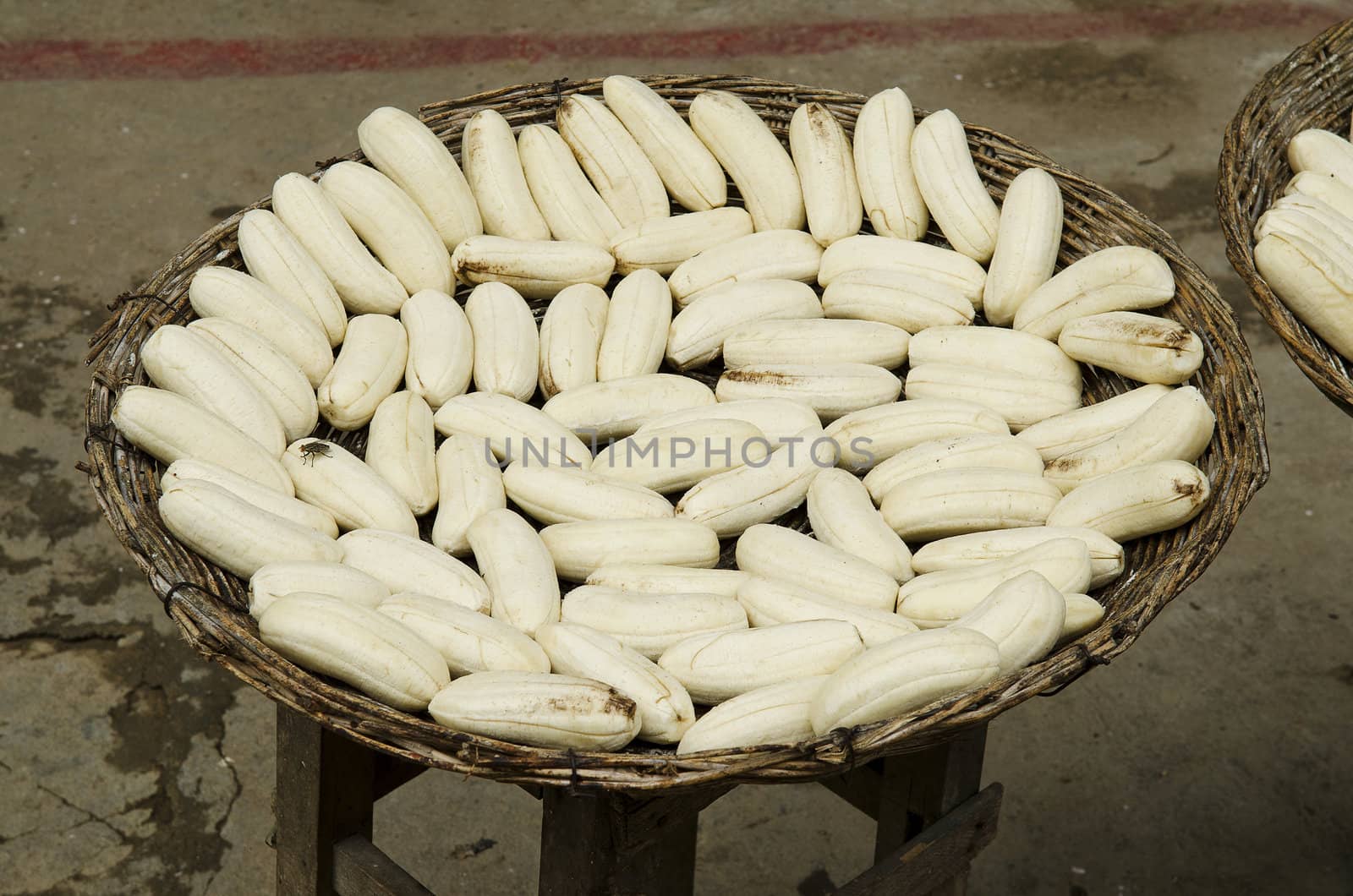 bananas drying in street cambodia