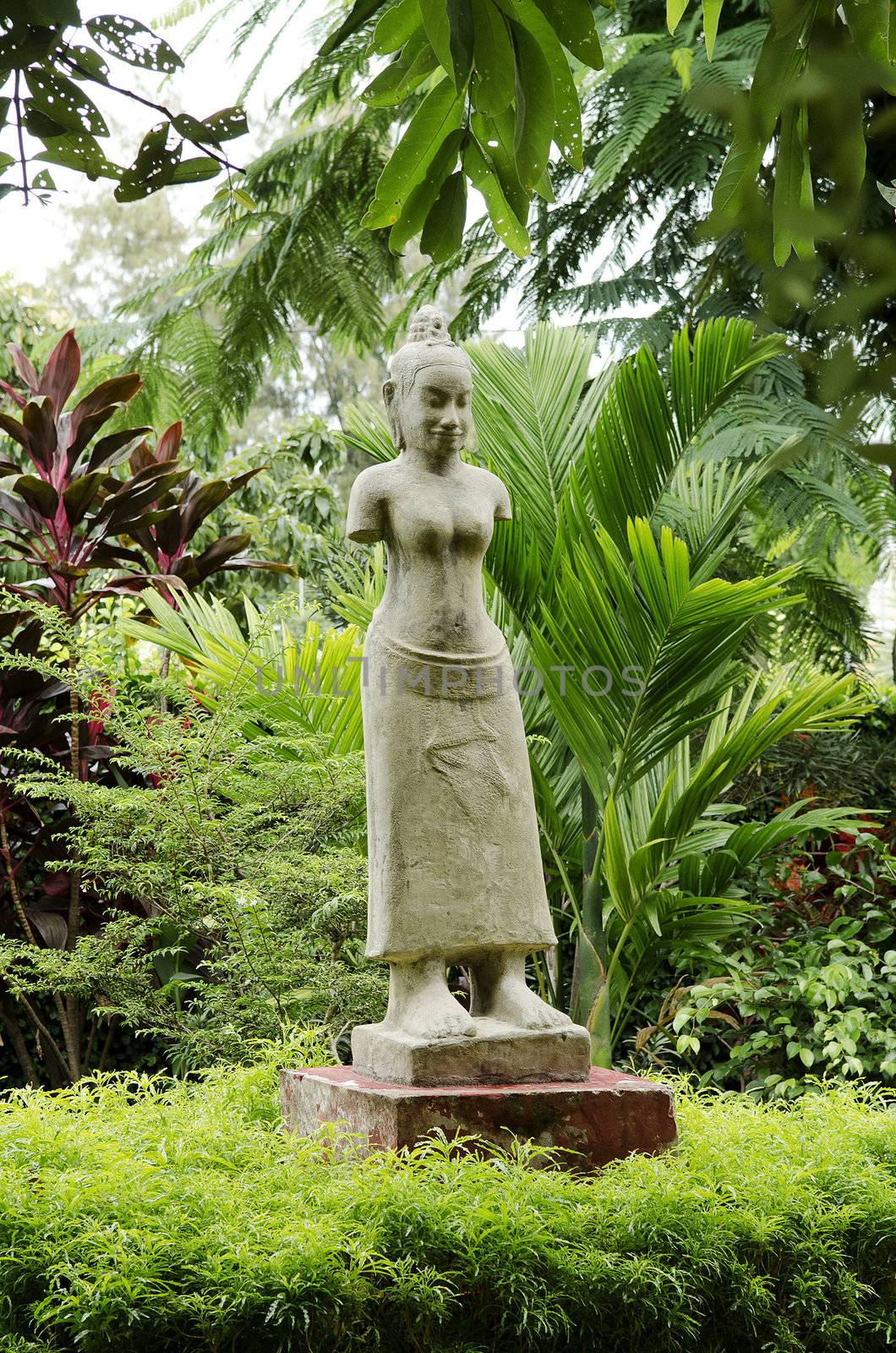 buddhist statue in phnom penh cambodia garden by jackmalipan