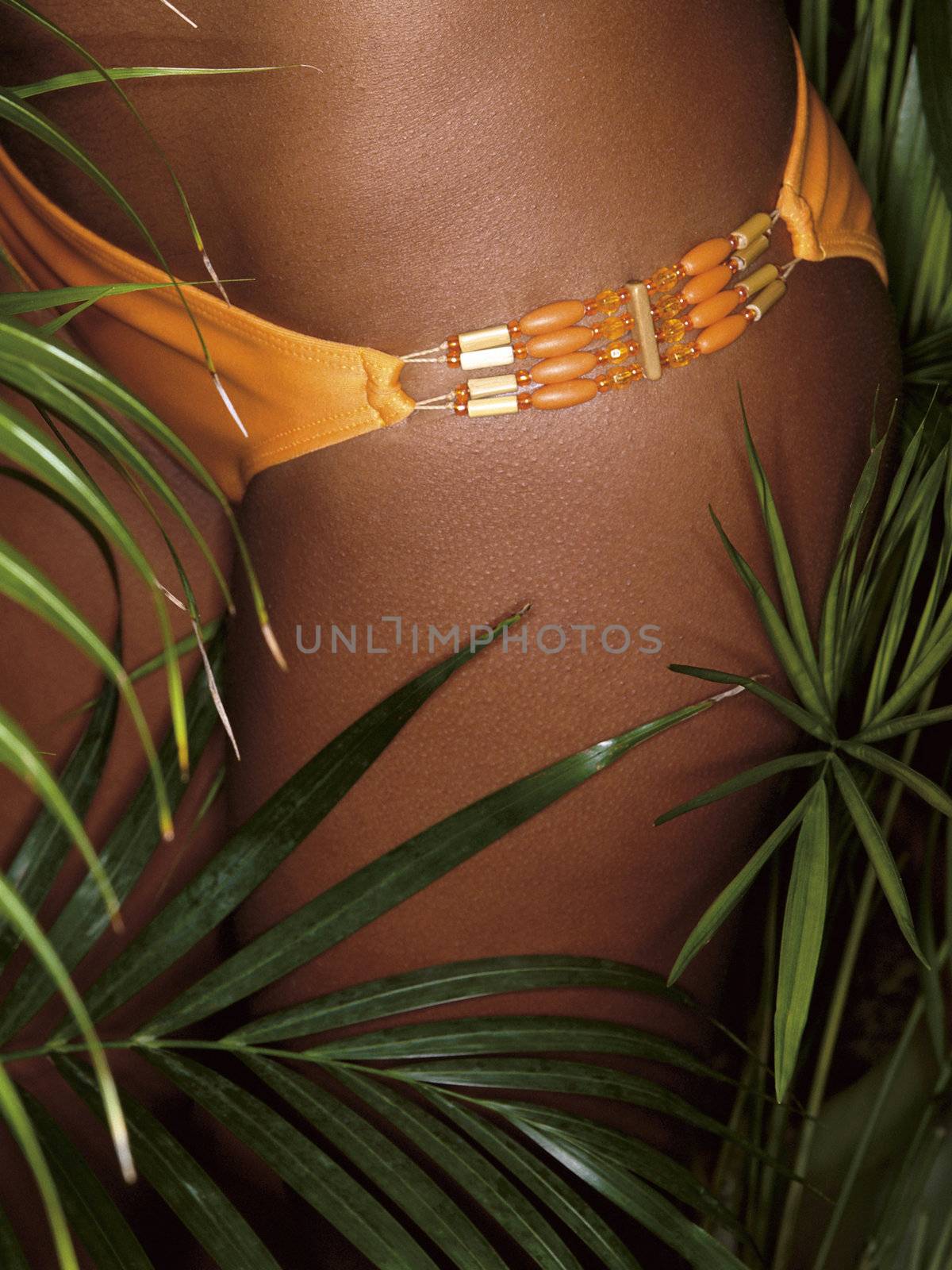 photo of girl thighs in orange bikini by jackmalipan