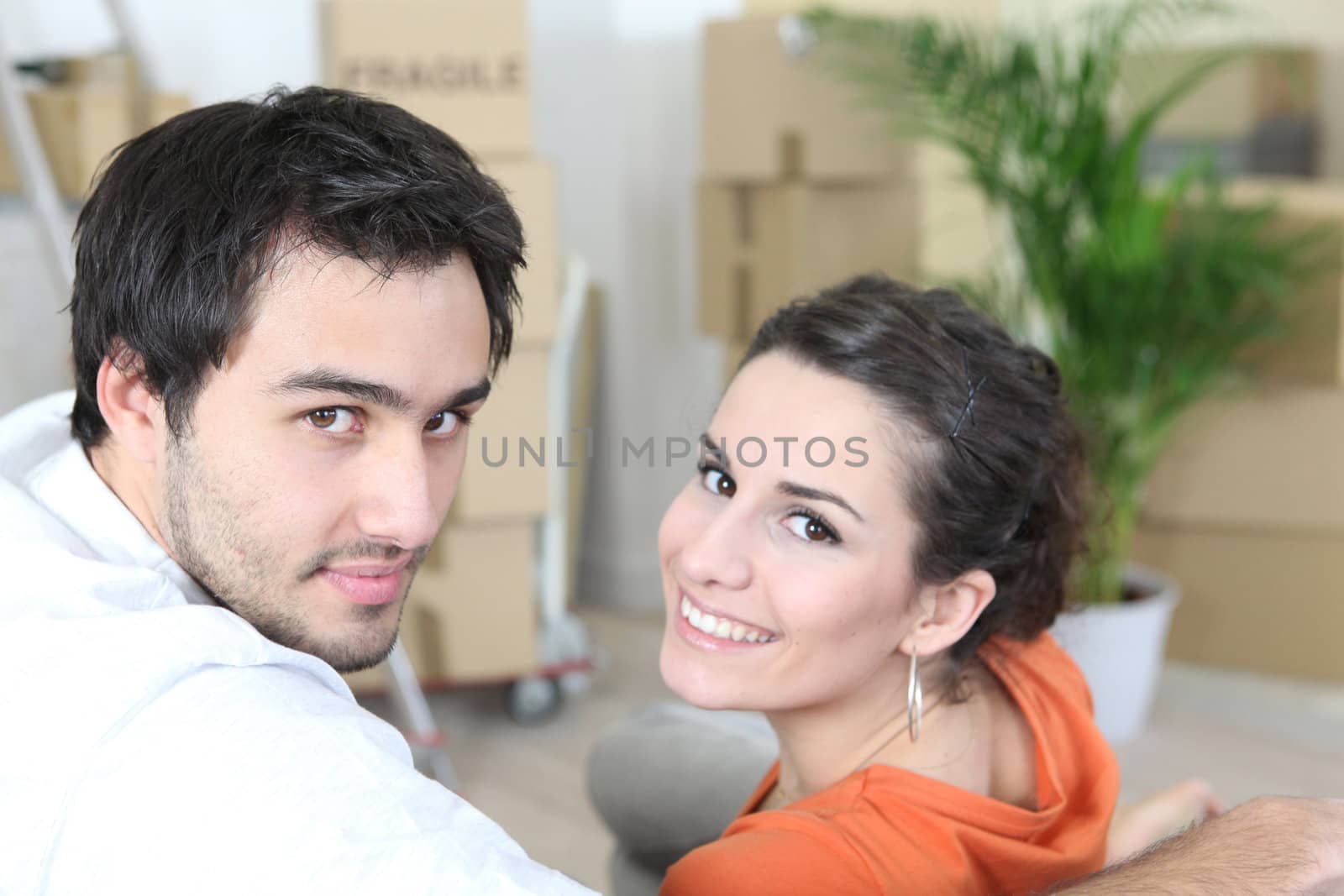 Couple moving house by phovoir