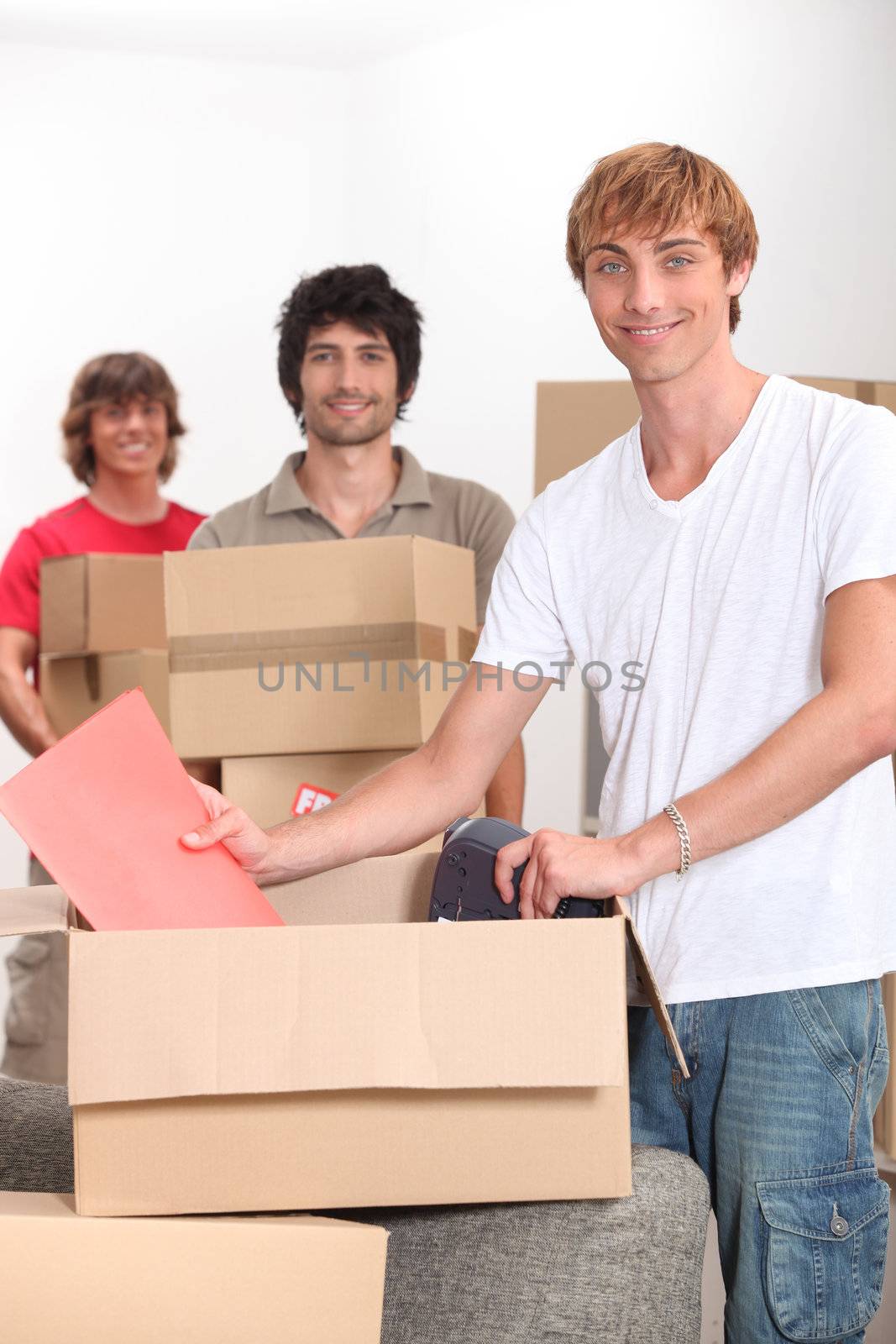 Three men moving house