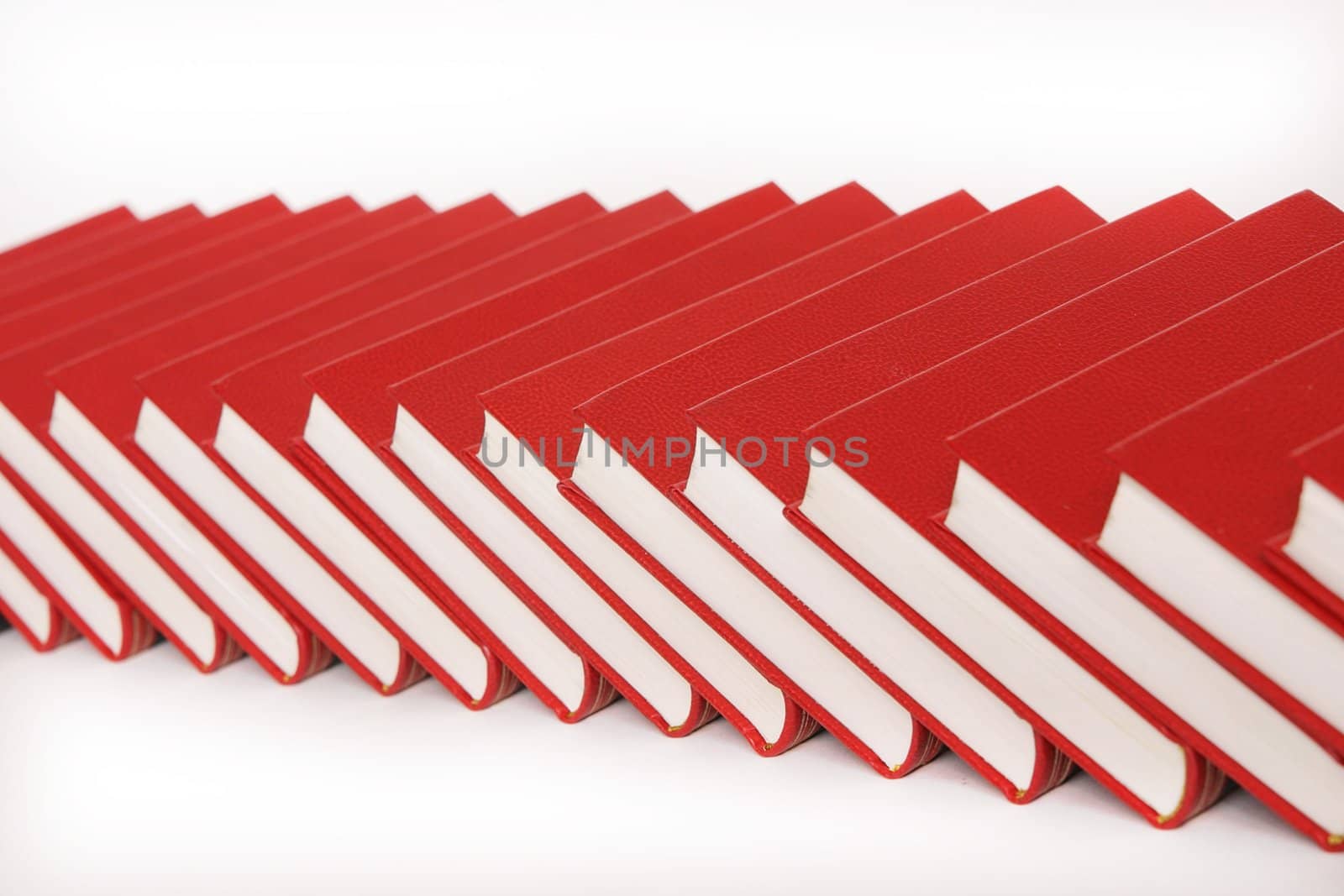 stack of red books isolated on white