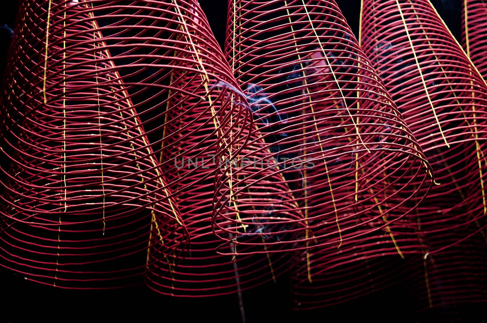 incense coils in chinese temple ho chi minh saigon vietnam by jackmalipan