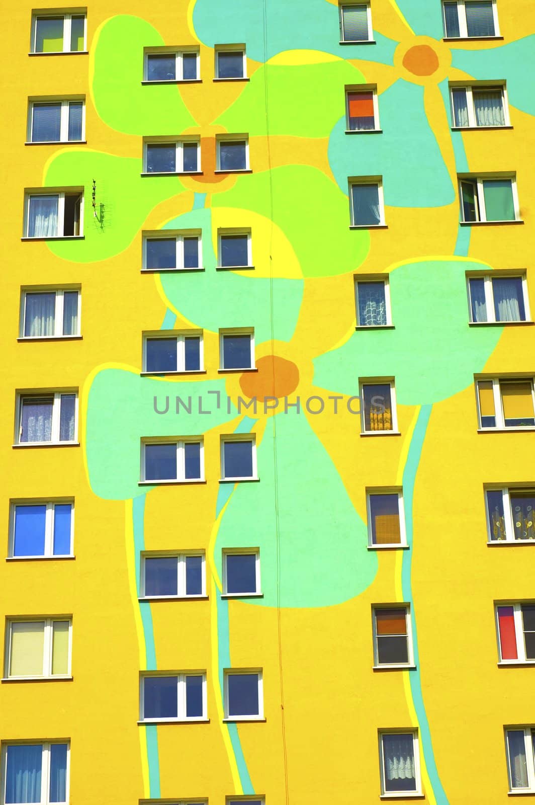 building with many window and flower pattern