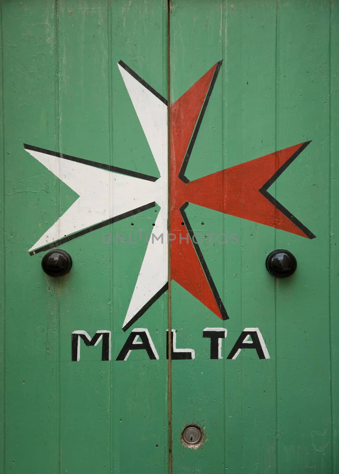 maltese cross painted on door in malta island europe by jackmalipan