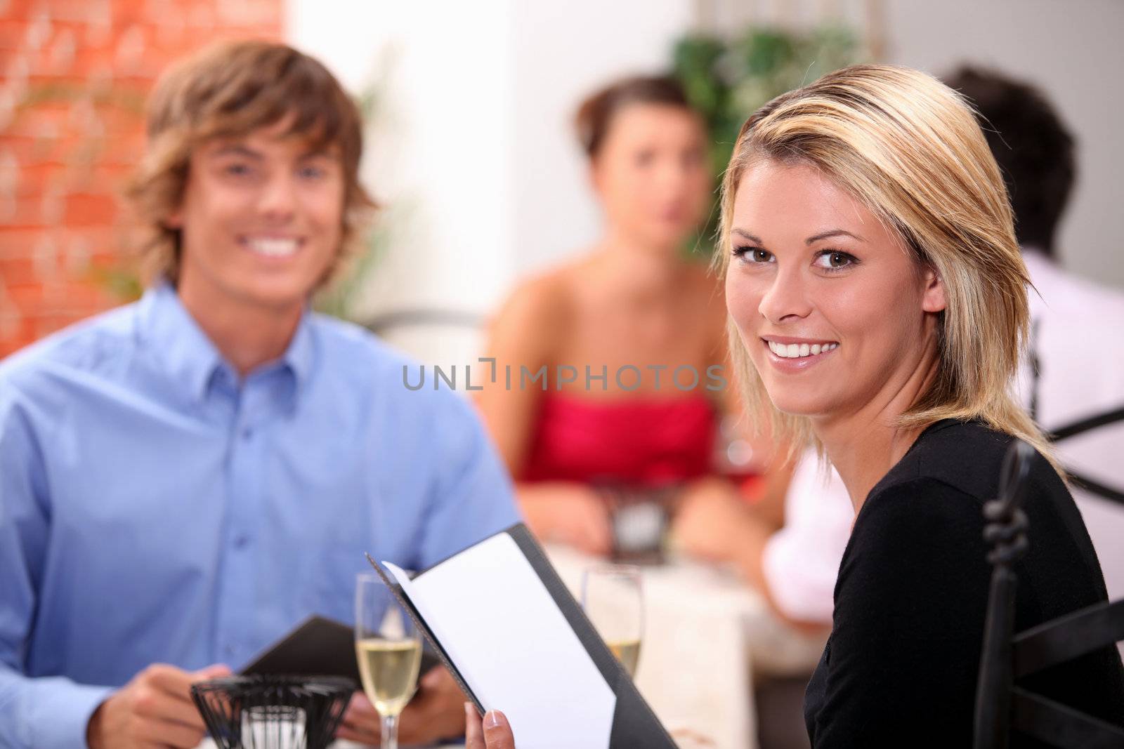 Young couple having dinner in a restaurant