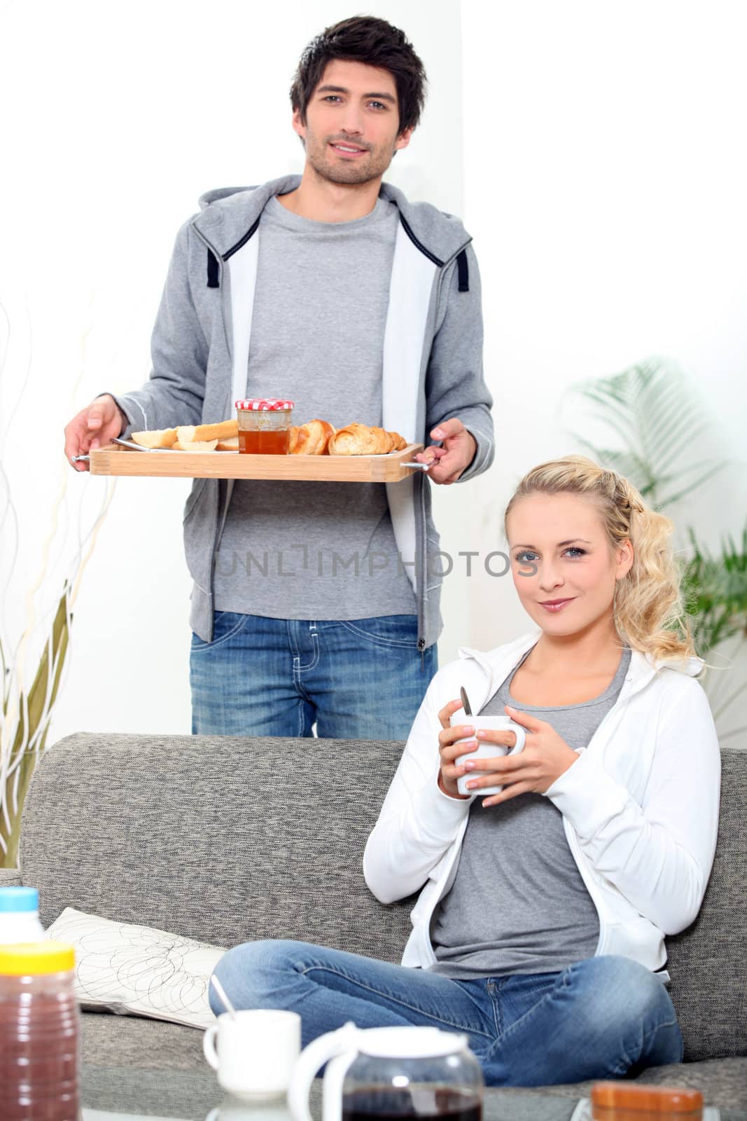 couple having breakfast by phovoir