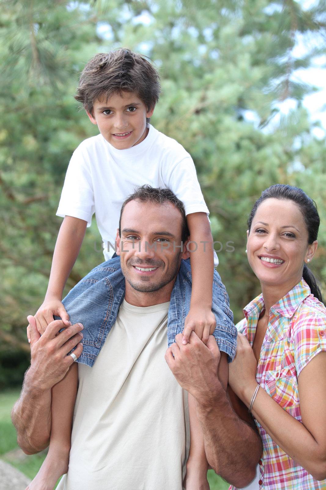 Family in the countryside by phovoir