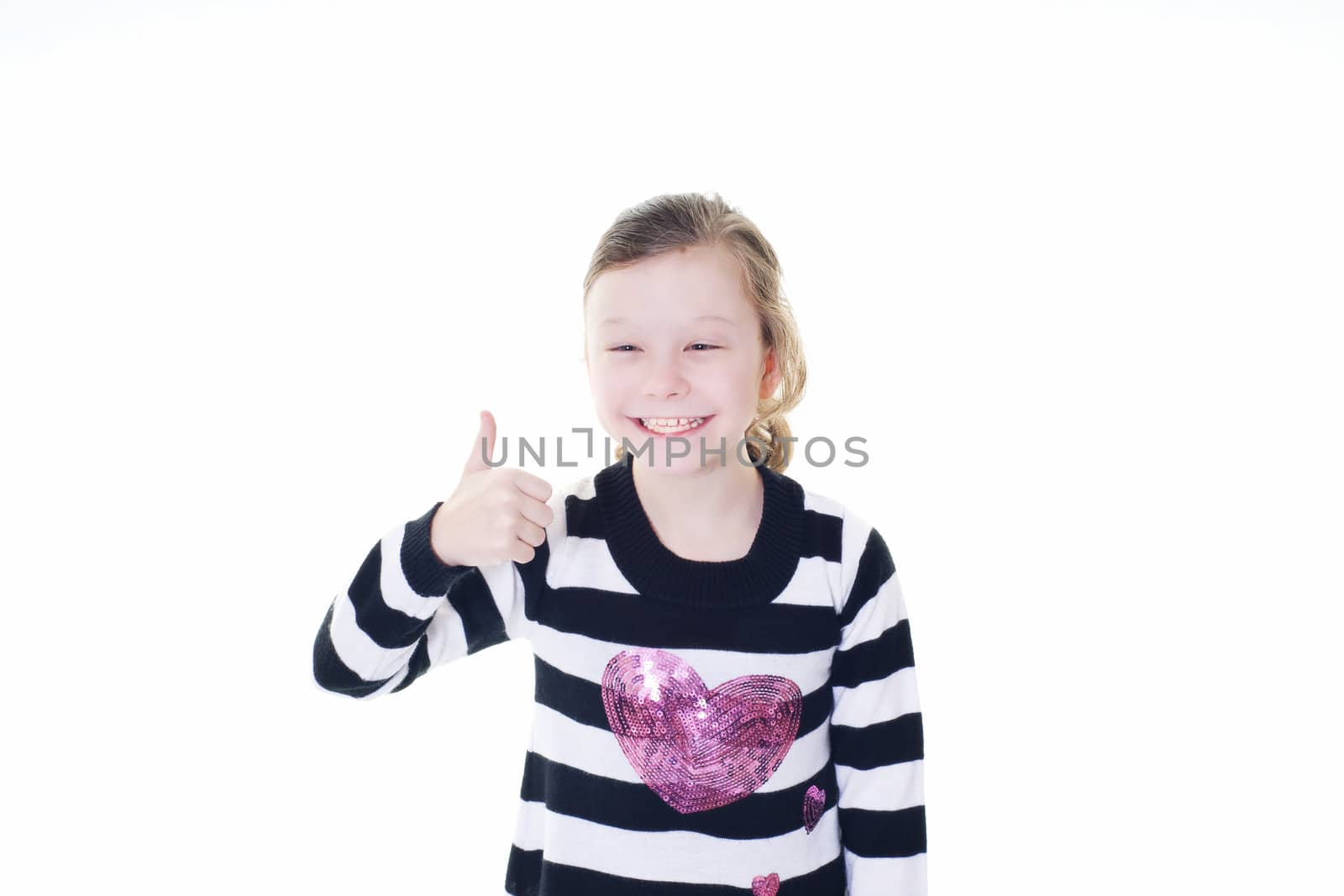 young girl giving a thumbs up gesture isolated on white