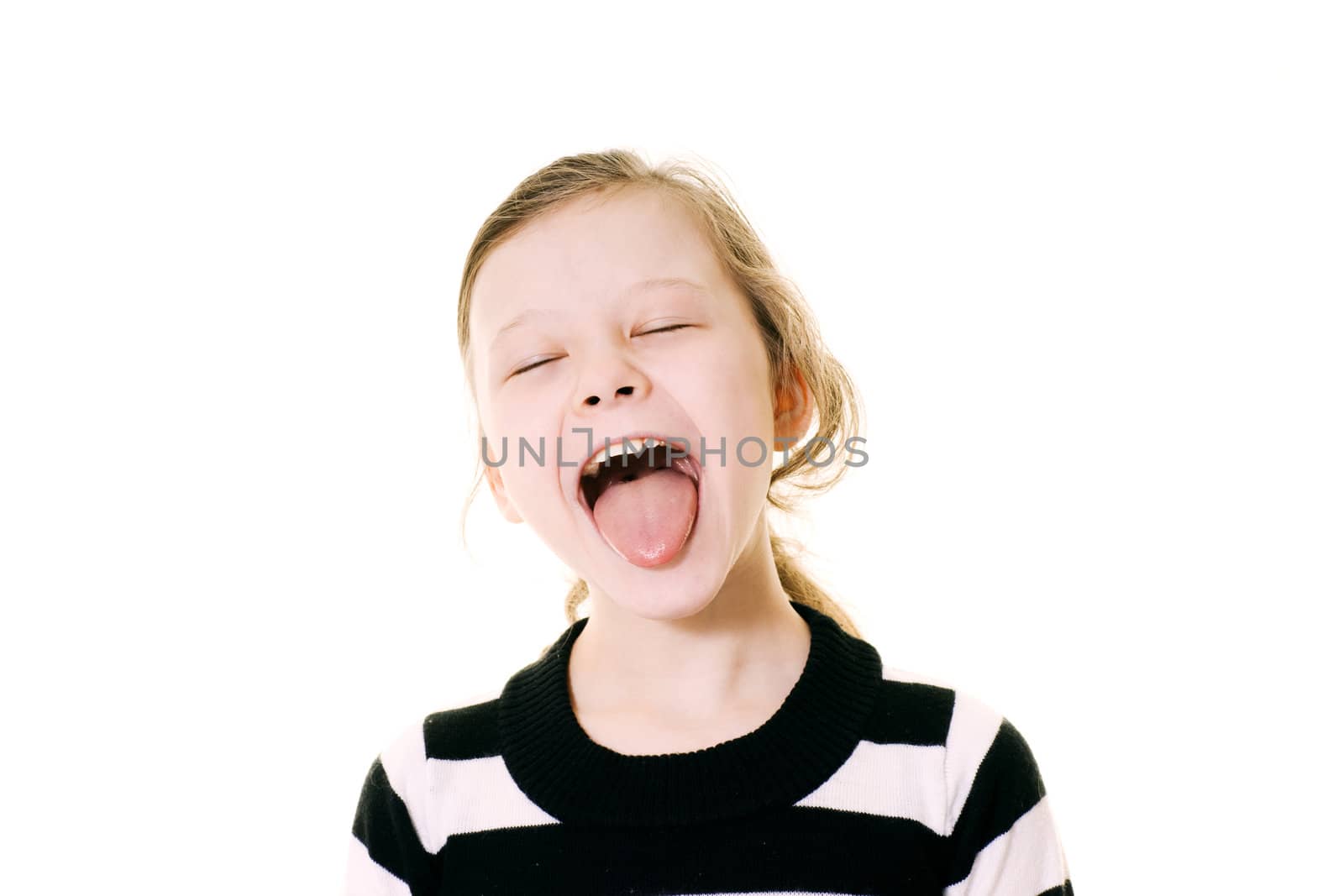 young girl sticking her tongue out isolated on white