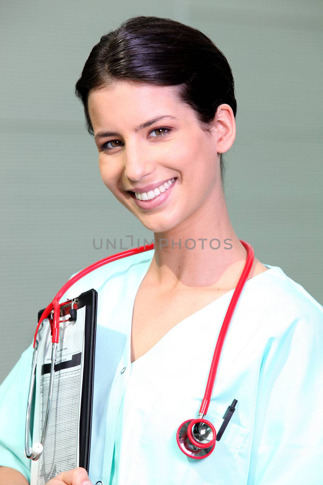 Portrait of a smiling nurse by phovoir