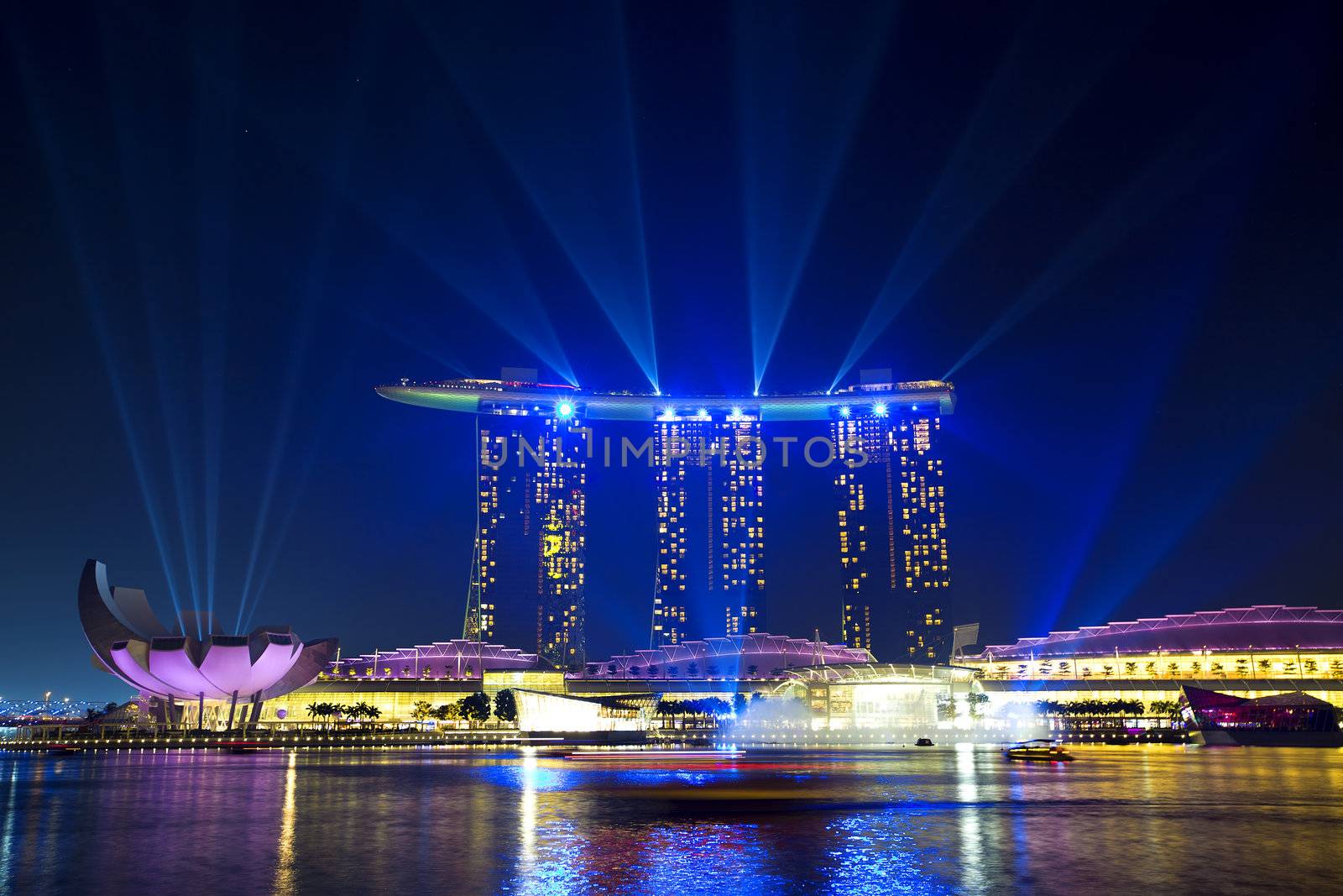 SINGAPORE  - APRIL 25: Wonder Full light show at Marina Bay Sands April 25, 2012, Singapore. Southeast Asia's largest light and water show.