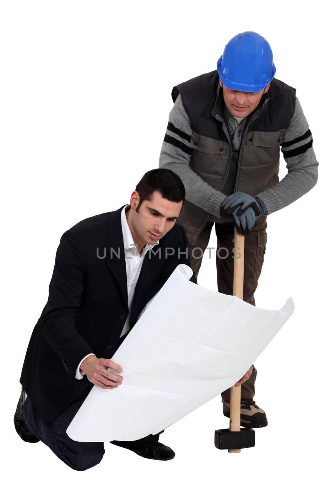 Construction worker working together with an engineer