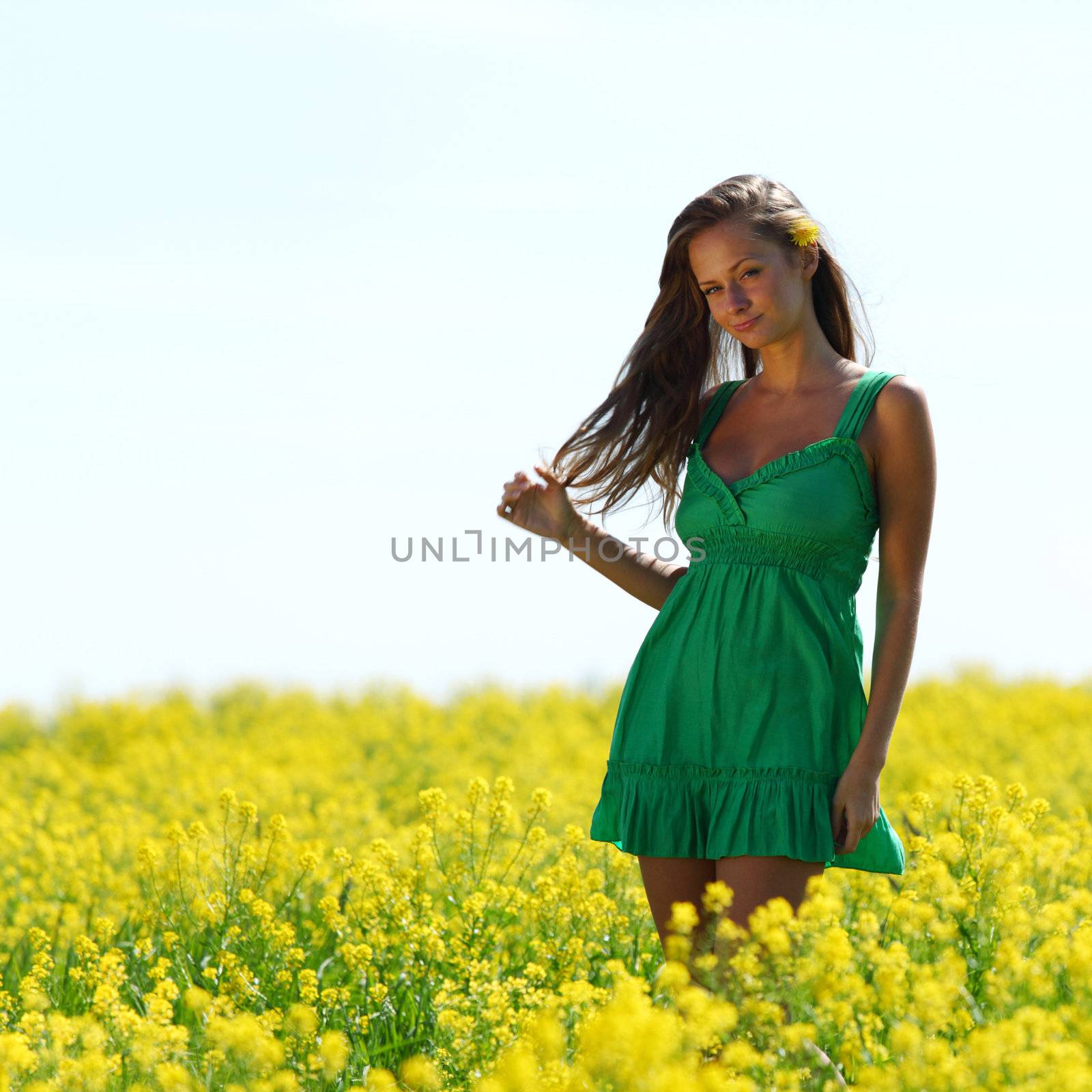 woman on oilseed field by Yellowj