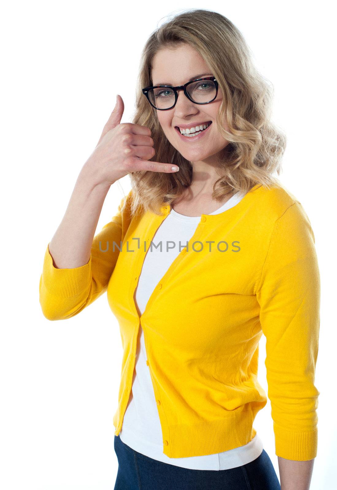 Smiling teenager gesturing call me