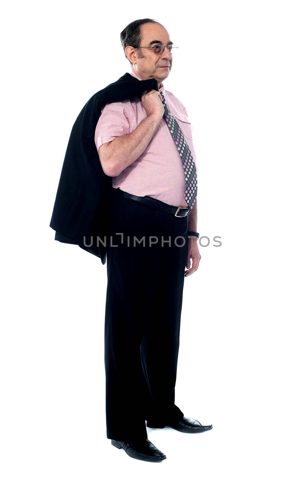 Executive holding coat over shoulders on white background