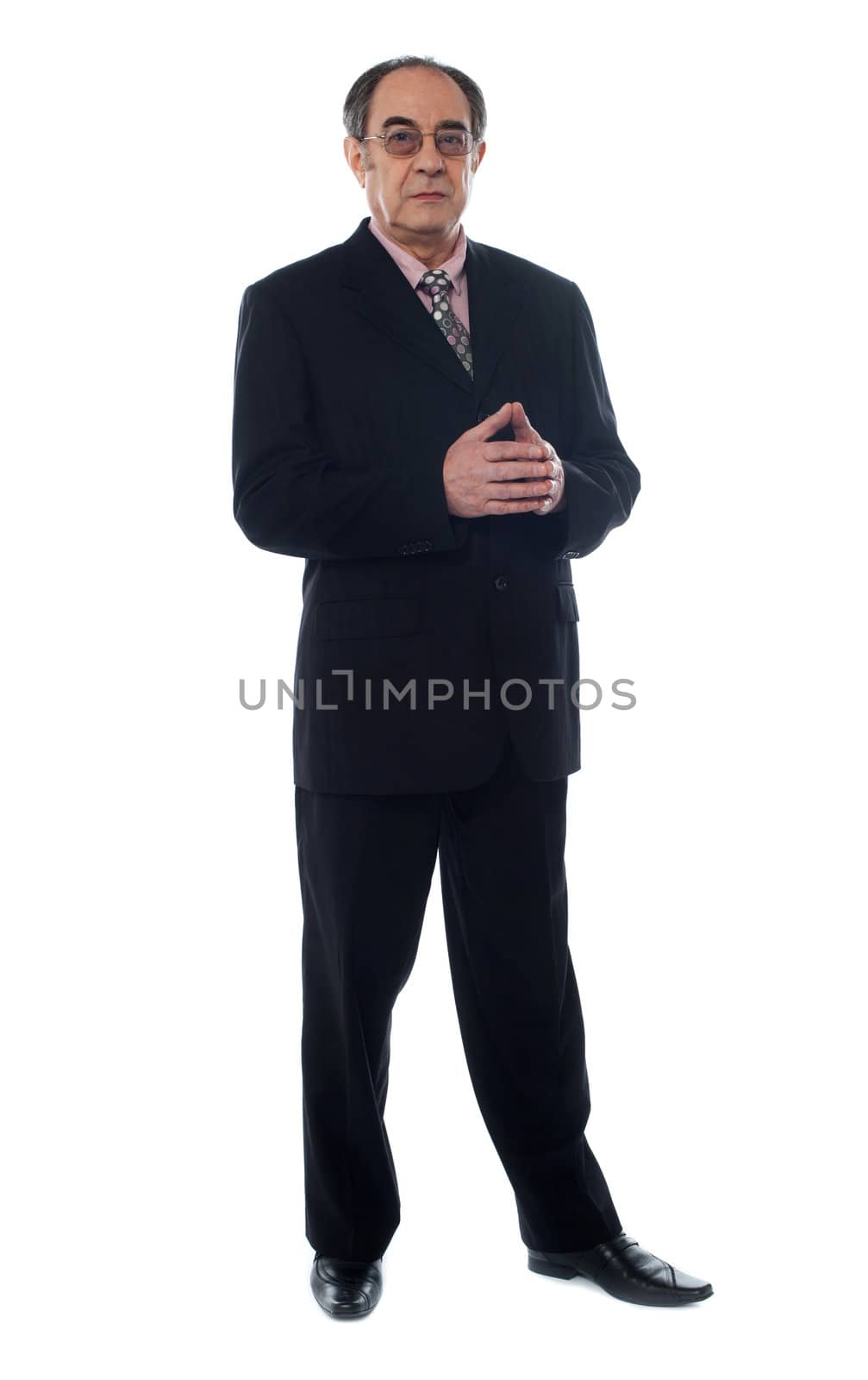 Elder businessman wearing glasses and posing in style against white background