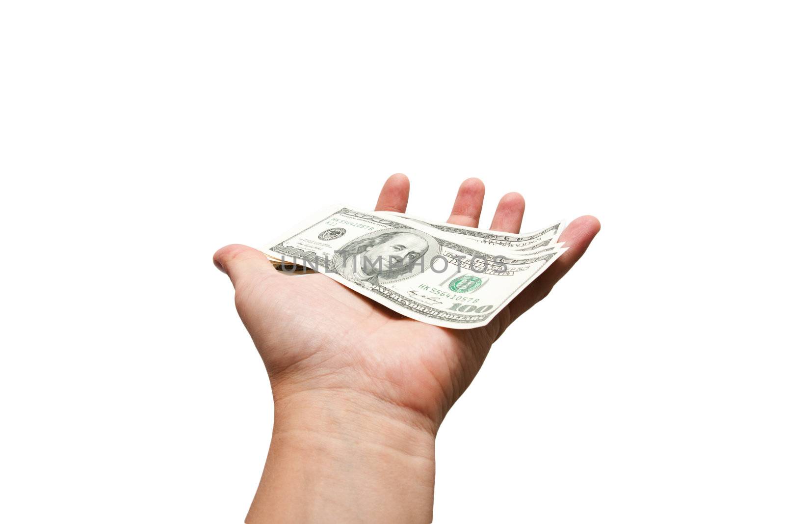 Dollars in a man's hand on a white background 