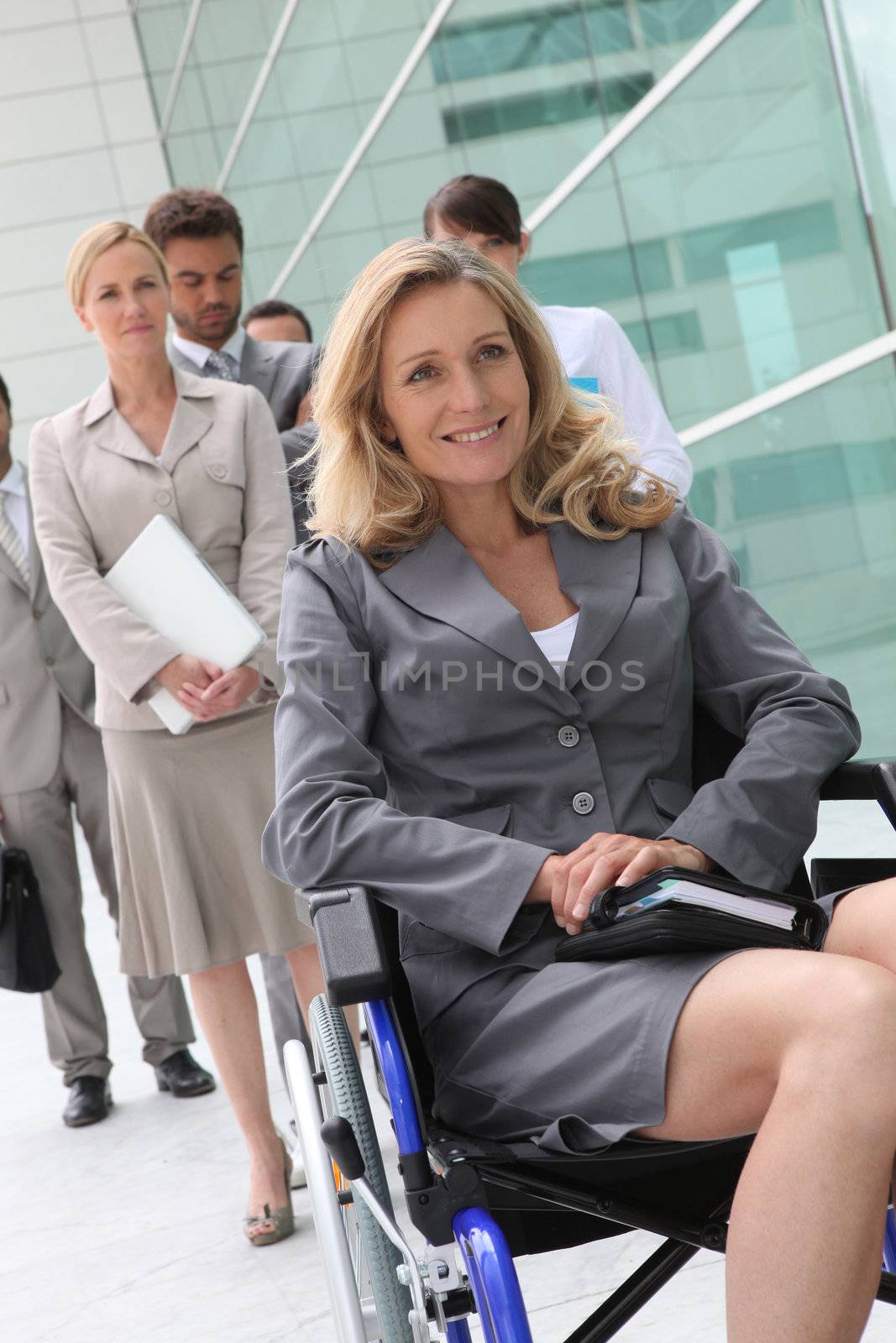 Successful businesswoman in wheelchair