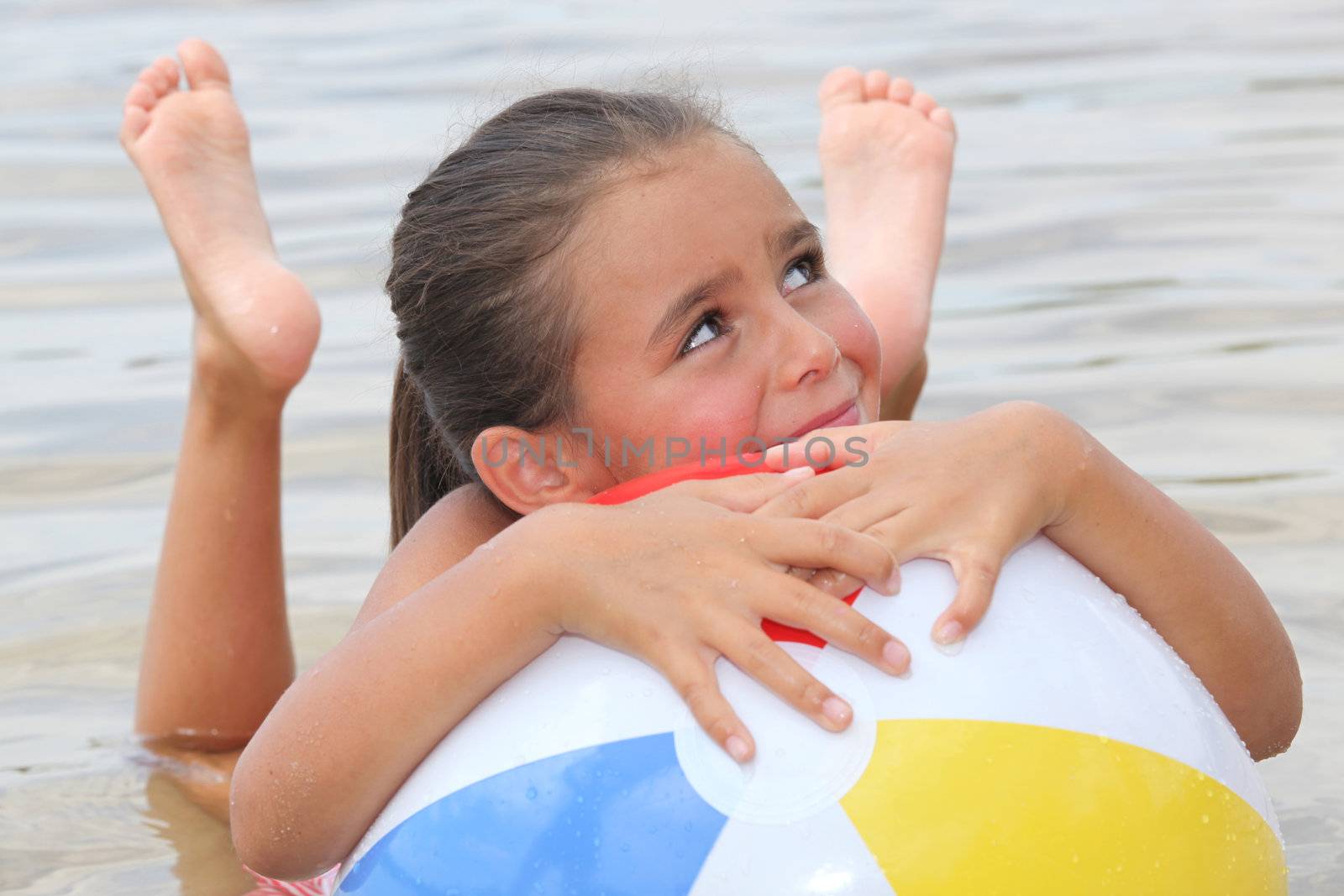 little girl swimming