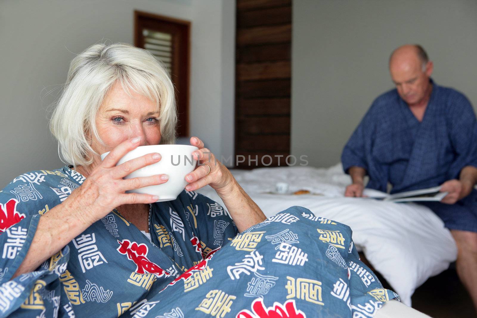 Elderly couple getting-up