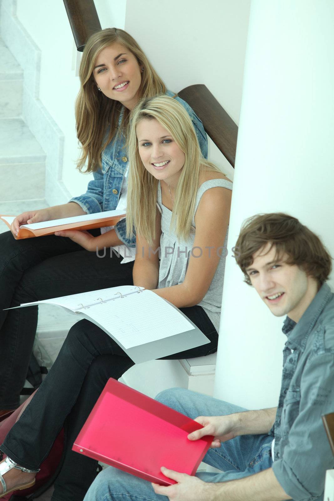 Teenagers sitting on steps