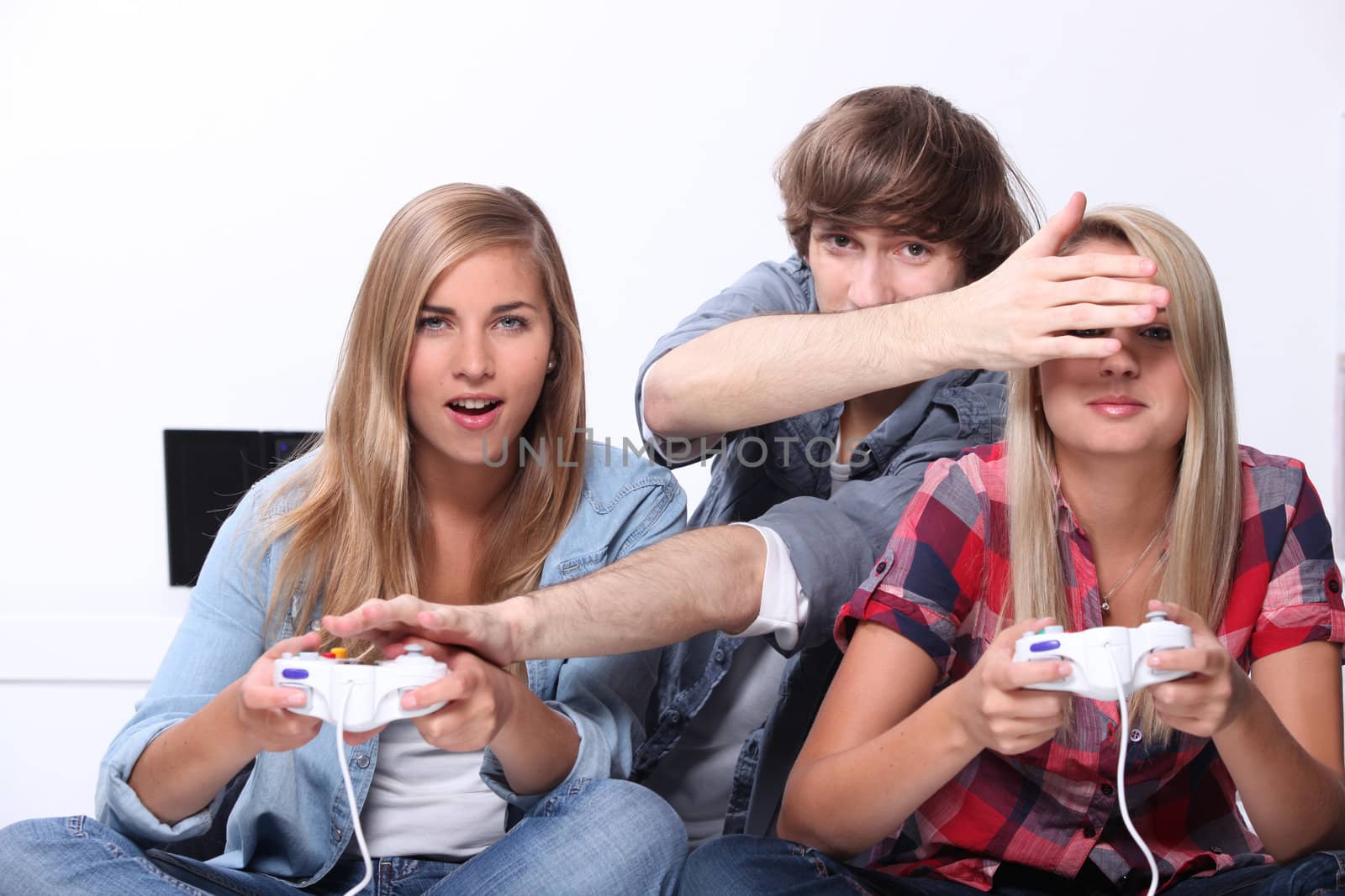teenagers playing video games