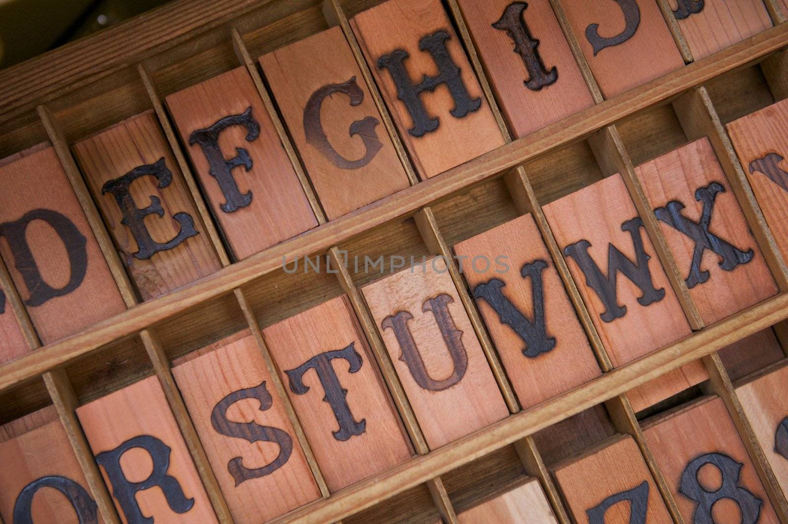 Blocks of wood with letters branded into them