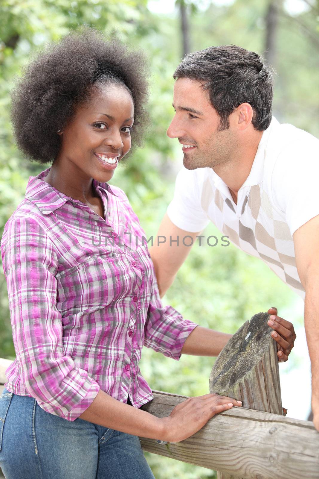 portrait of a couple outdoors by phovoir