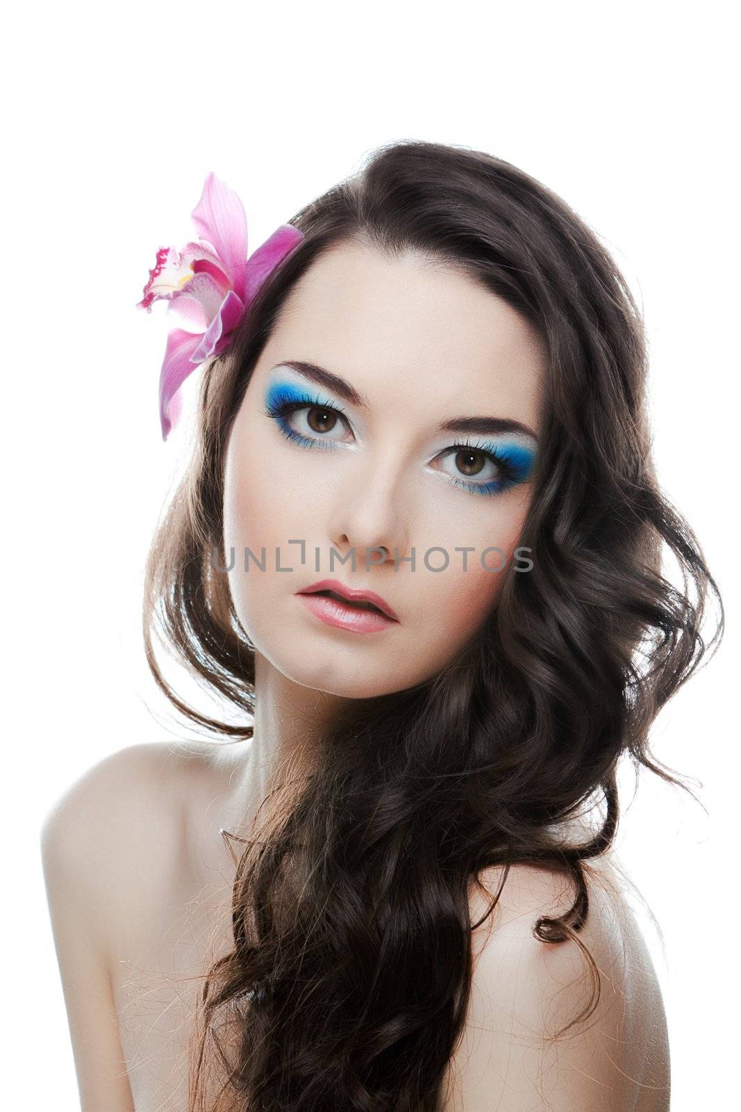 The beauty portrairt of woman with flower on head.