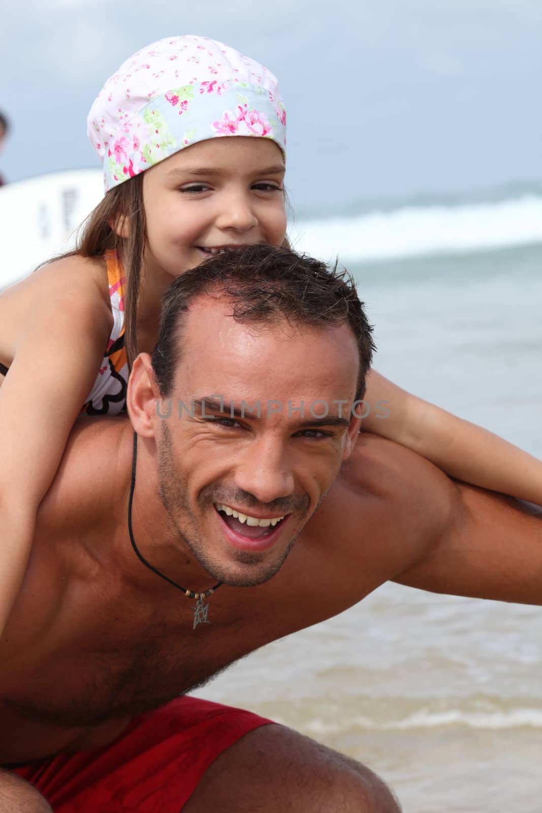 Father and daughter at the beach