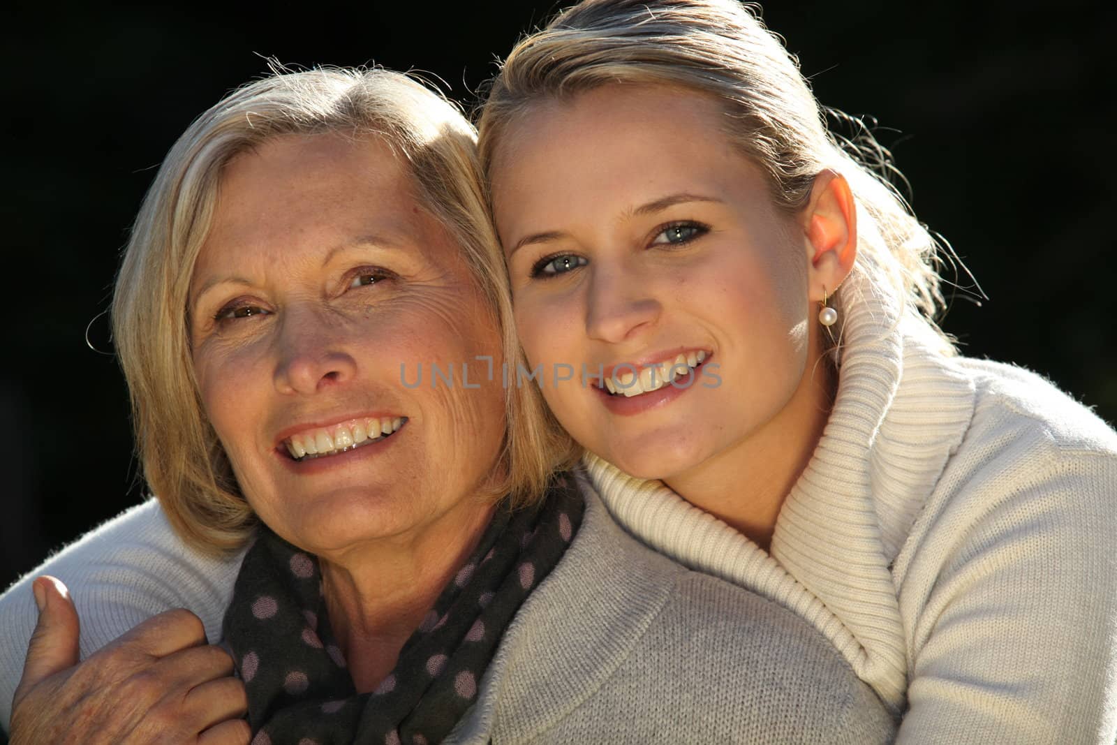 Mother and daughter outdoors