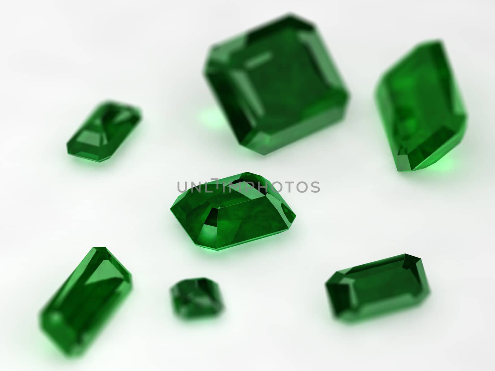 Seven Emeralds with thin dept of field on a white background