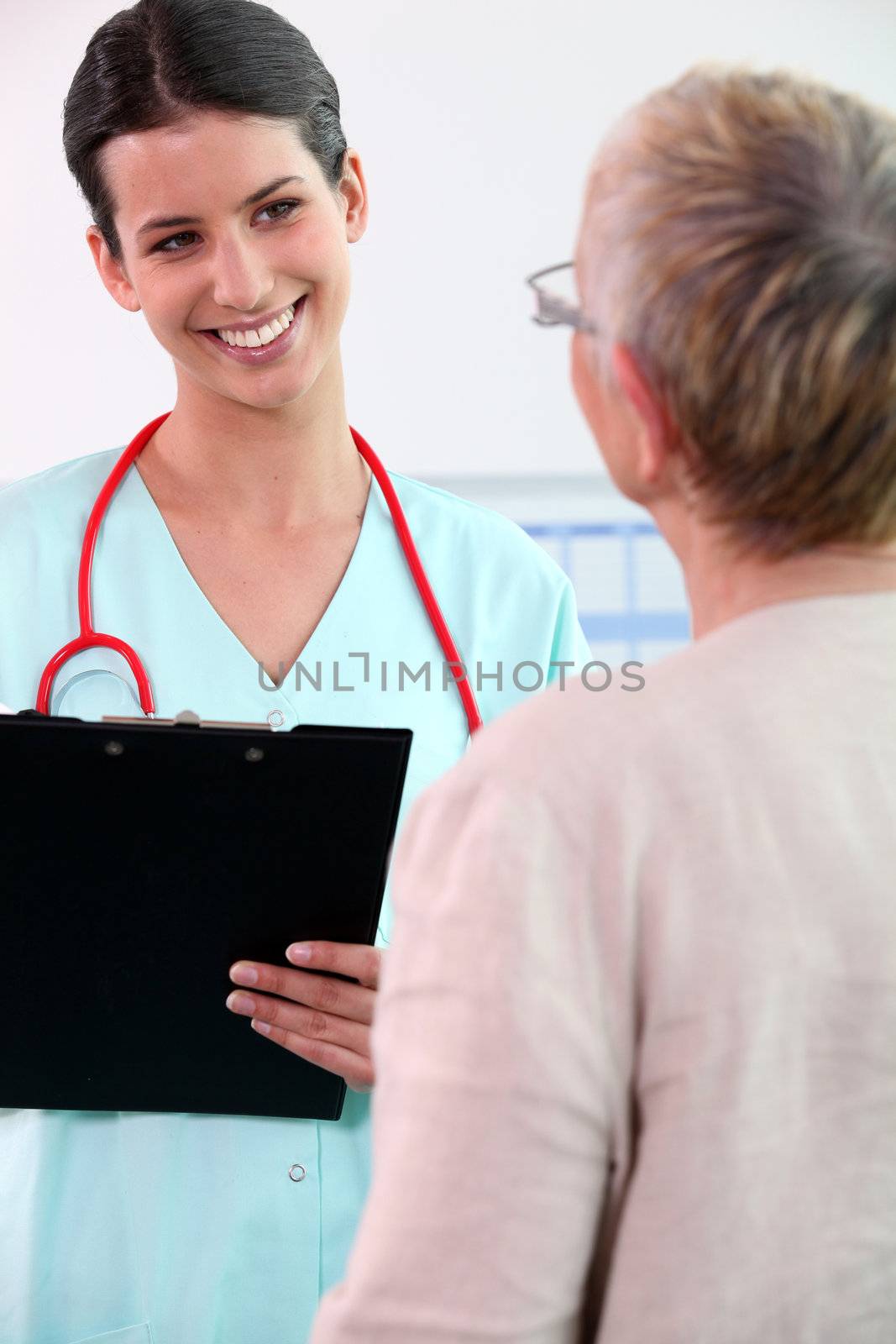 Young nurse in medical consultation