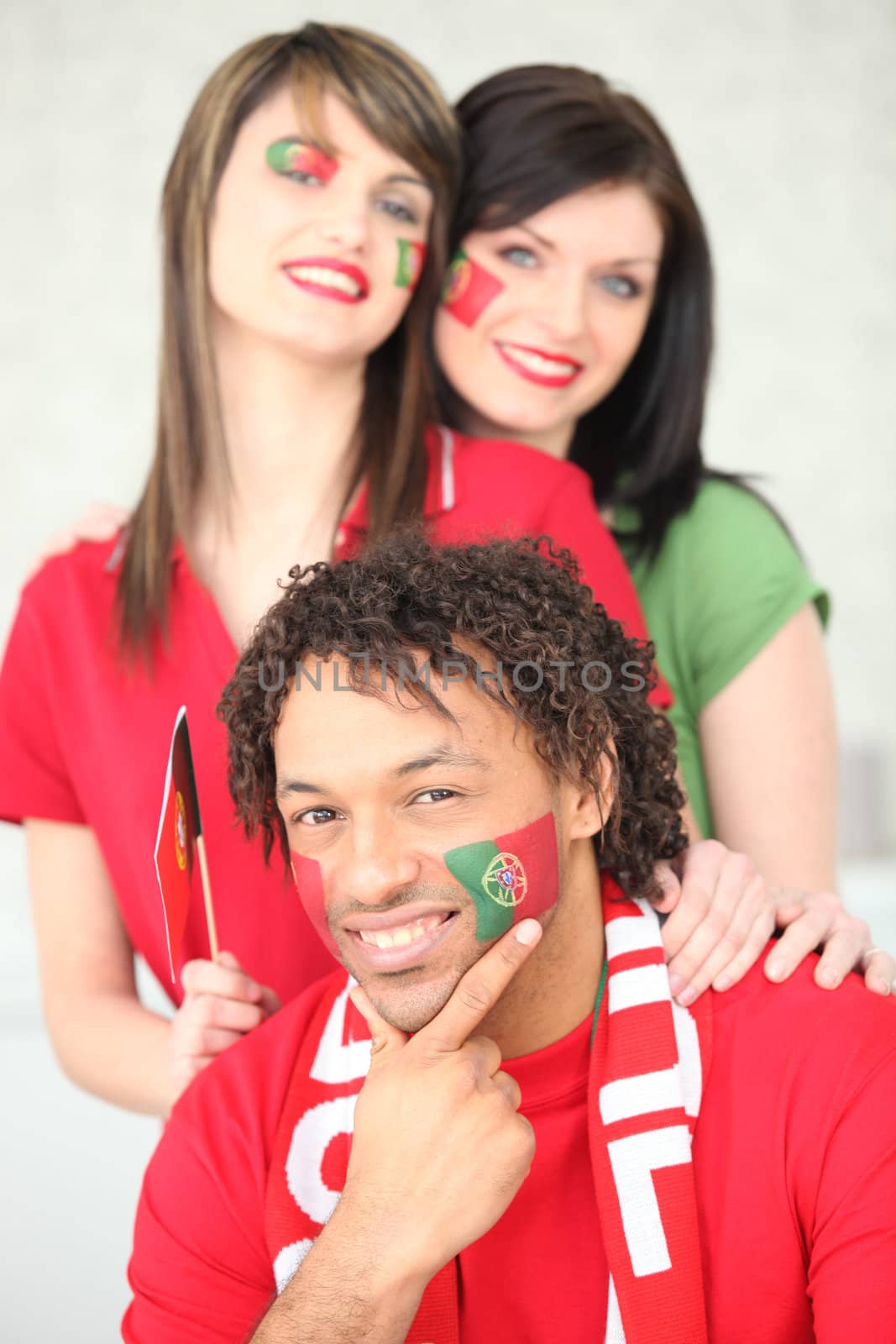Three Portuguese football supporters