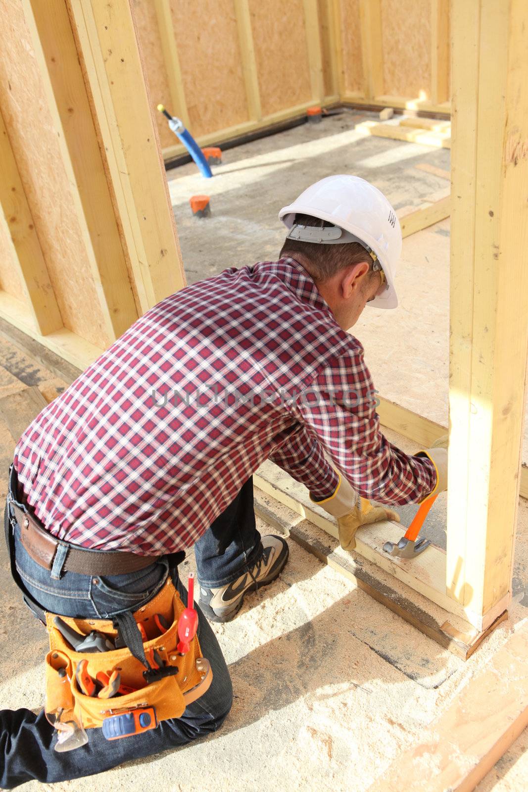 Carpenter doing the doorway.