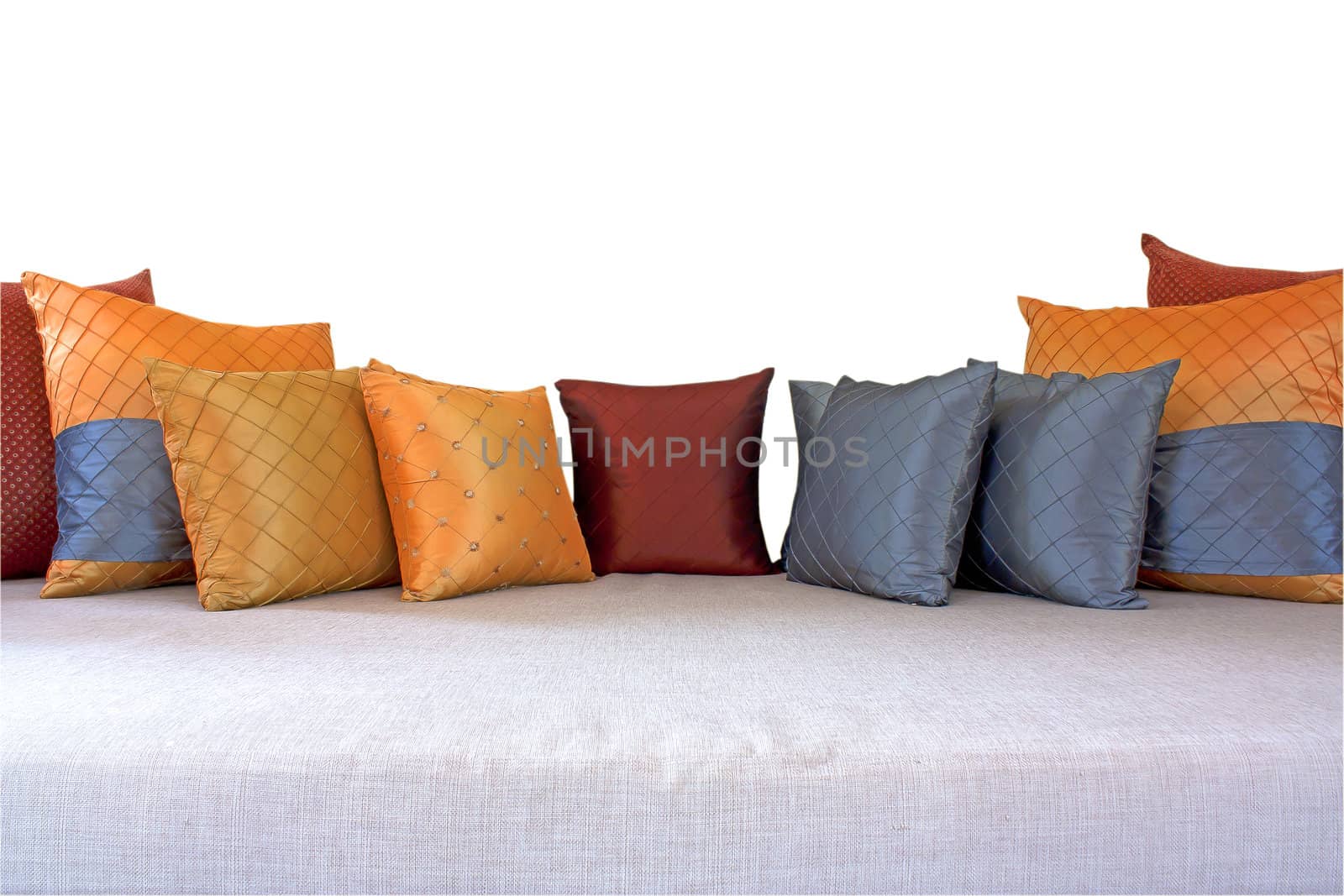 The colorful pillows scattered on the table.