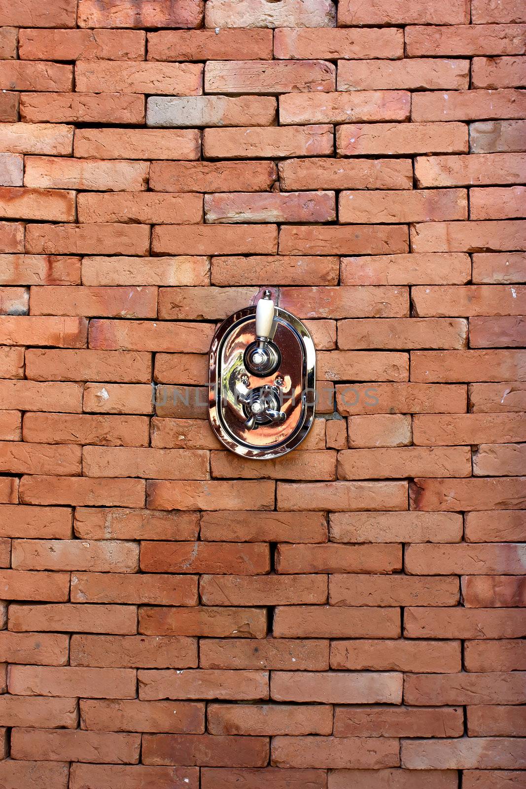 Brick walls, shower valves, shower facilities design and construction.