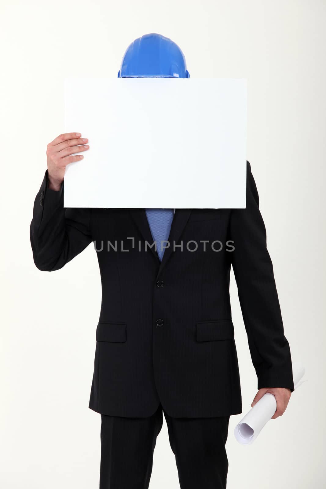 construction businessman hiding his face with a blank poster