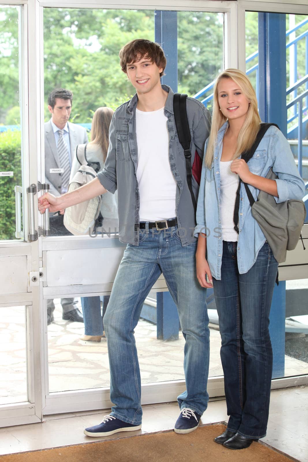 Young students leaving building