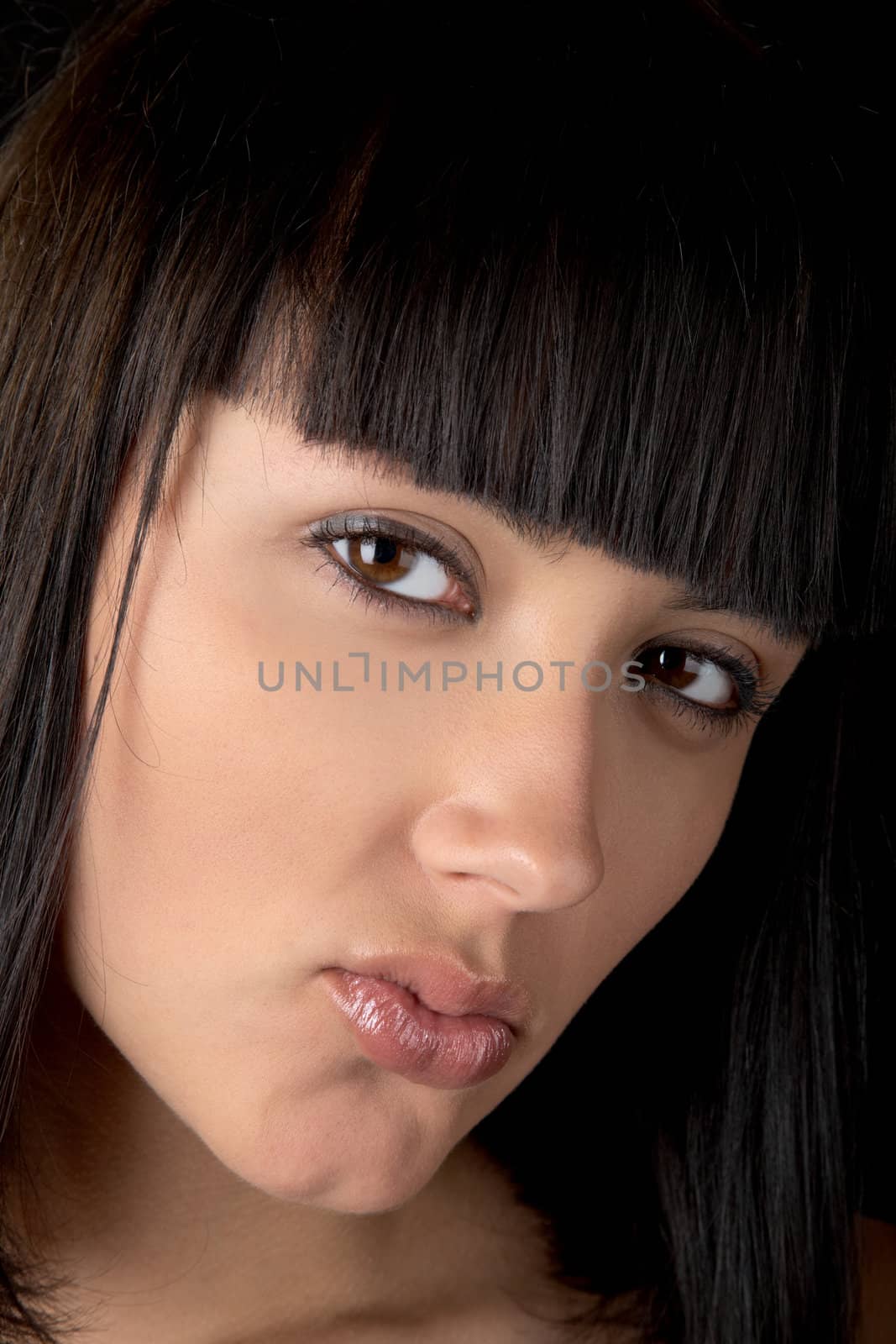 The girl with a malicious look close up