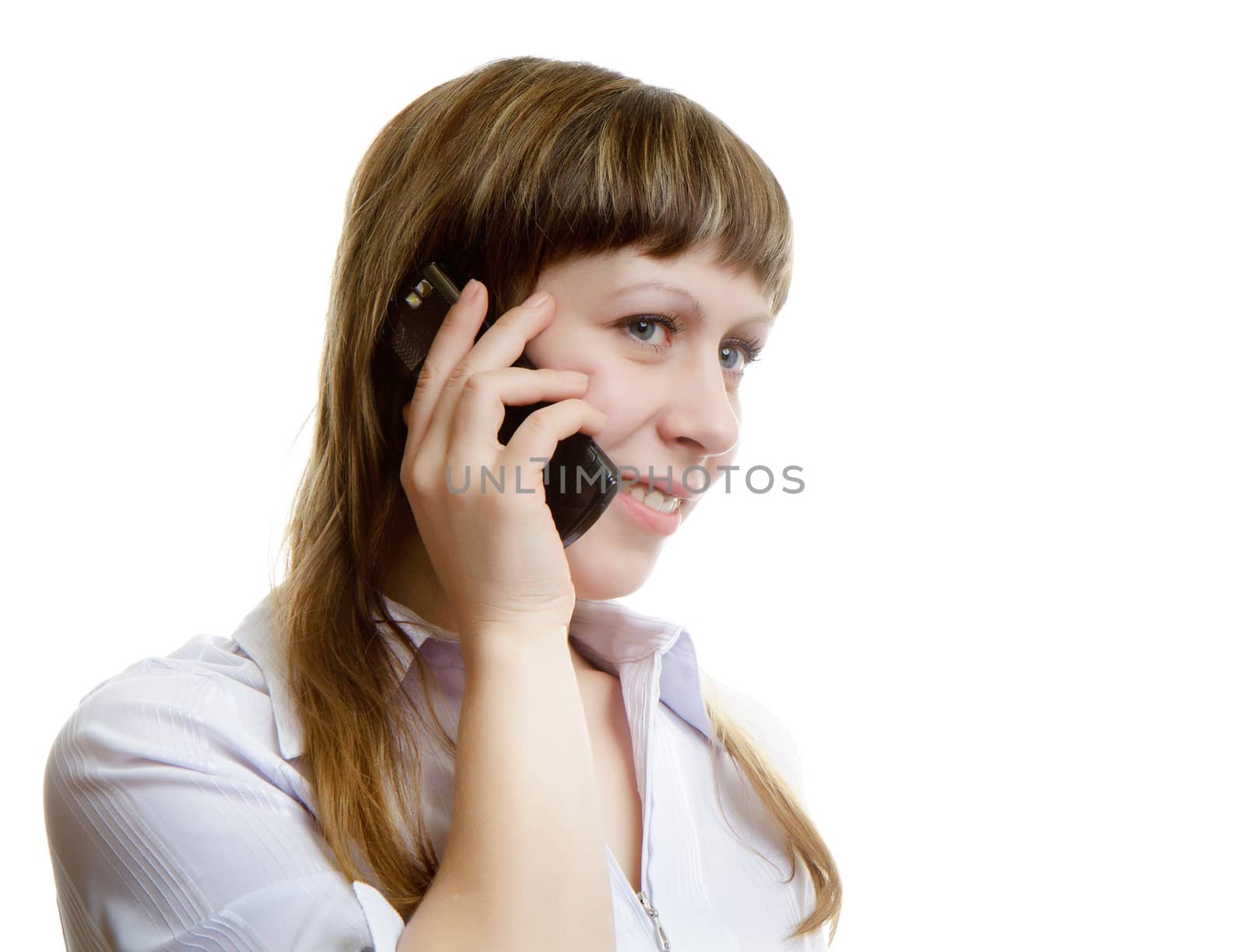 young woman talking on a cell phone on a white background