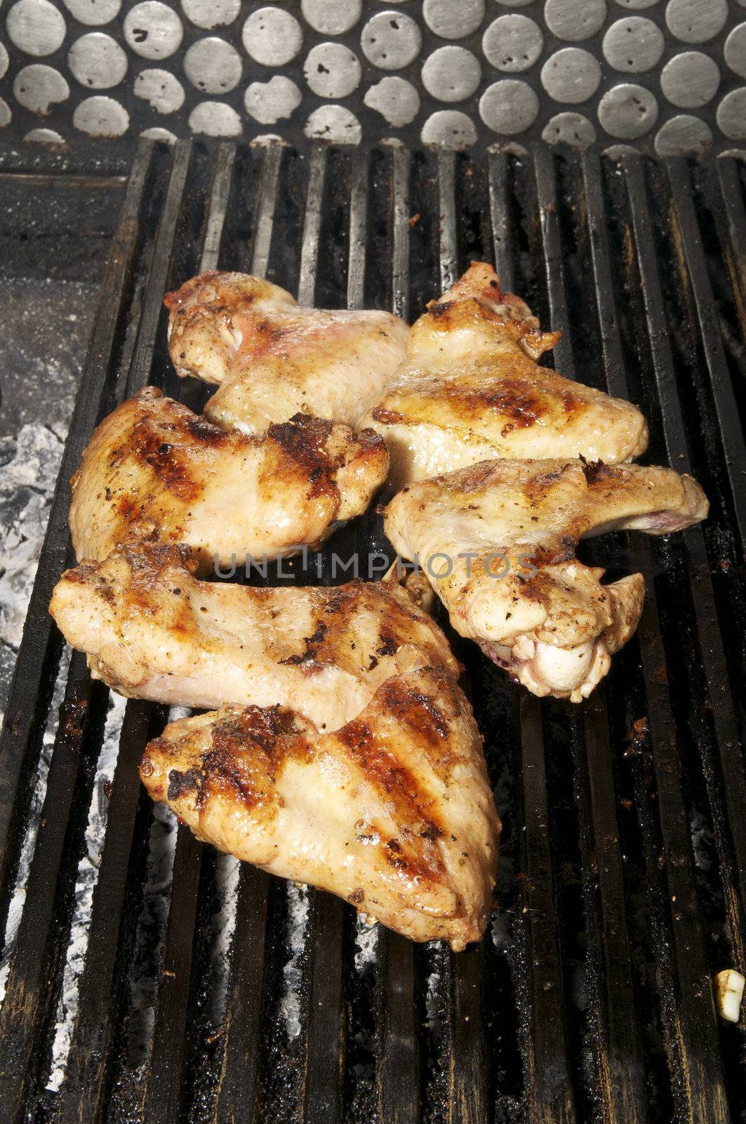 Bake the chicken wings on grill low heat