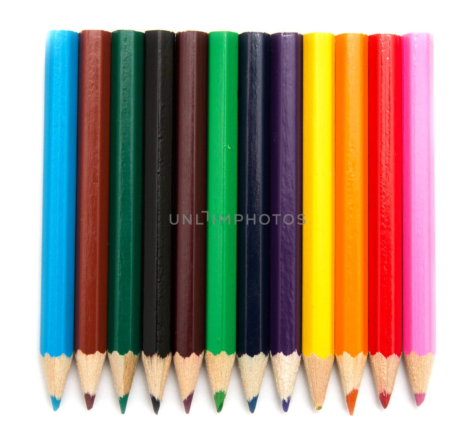 Colour pencils isolated on white background close up  by schankz