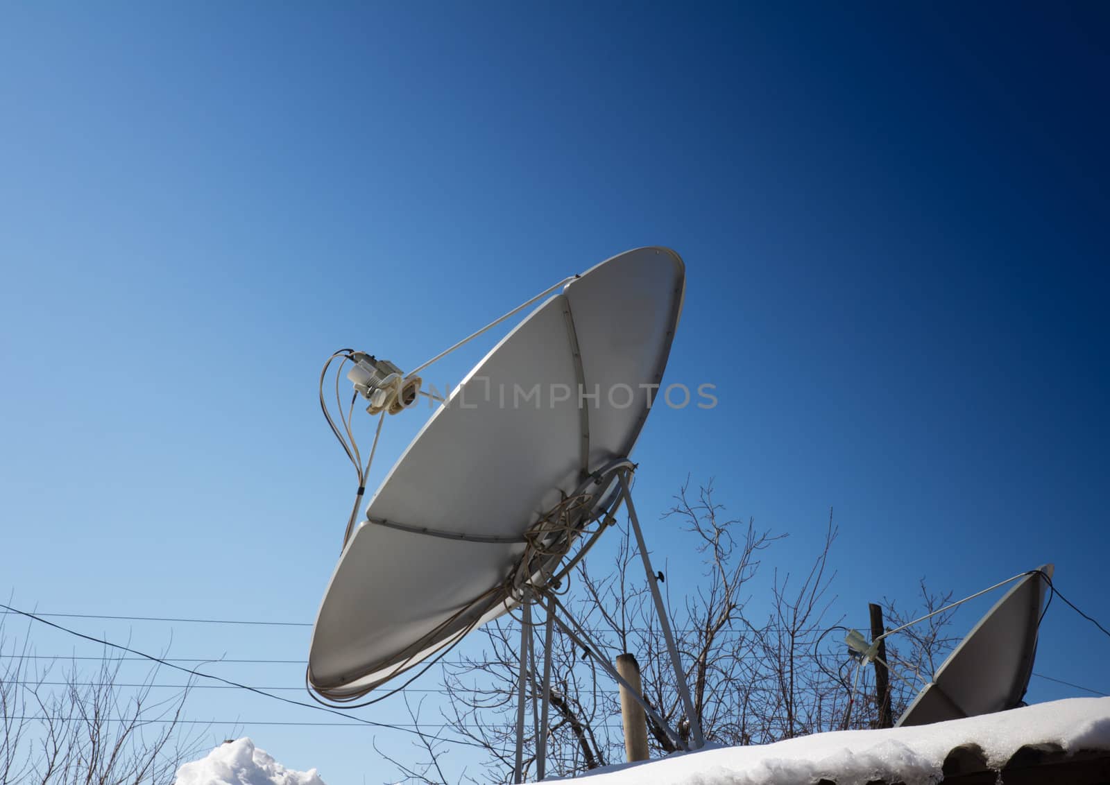 satellite dish on the roof by schankz