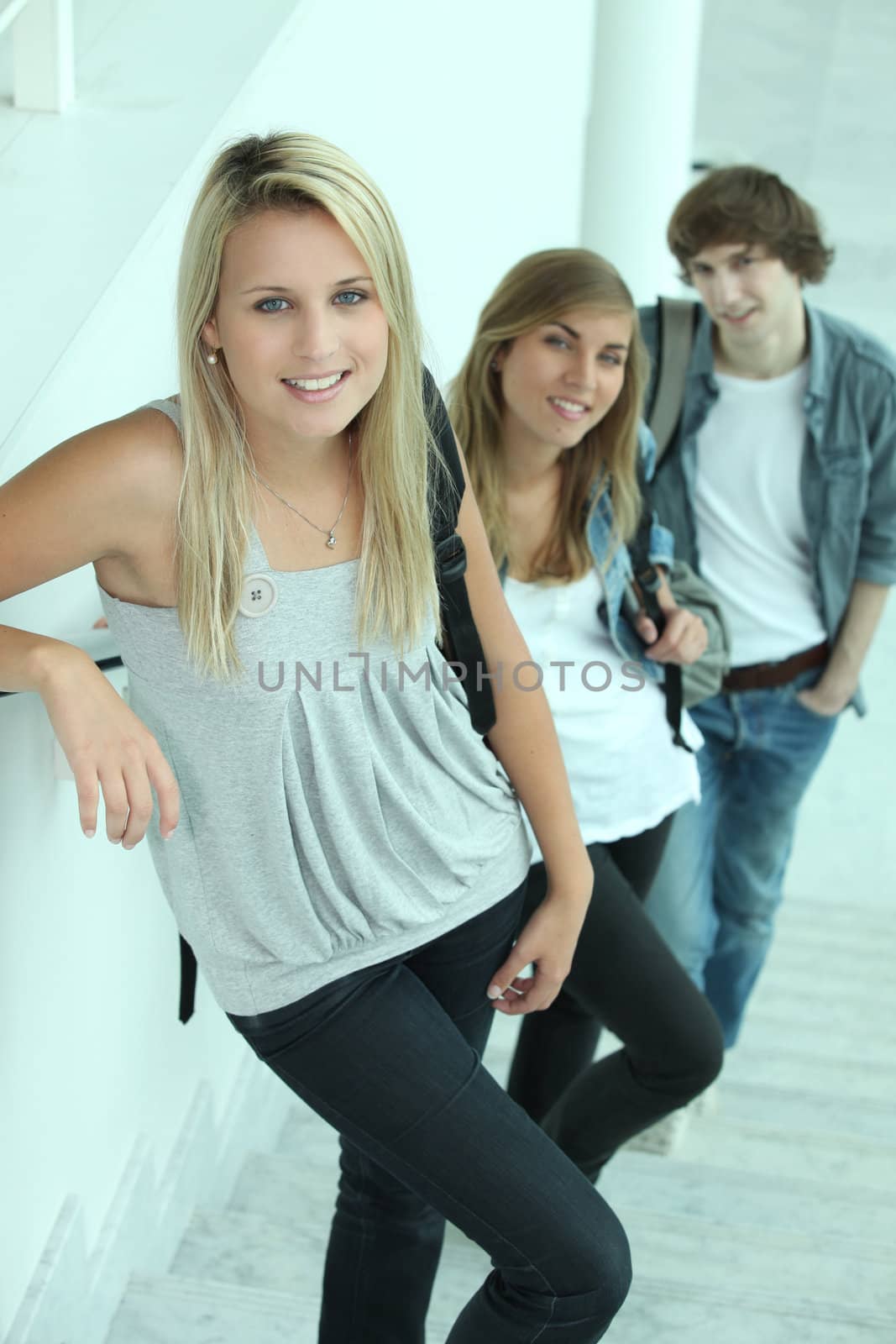 portrait of 3 teenagers in stairs by phovoir